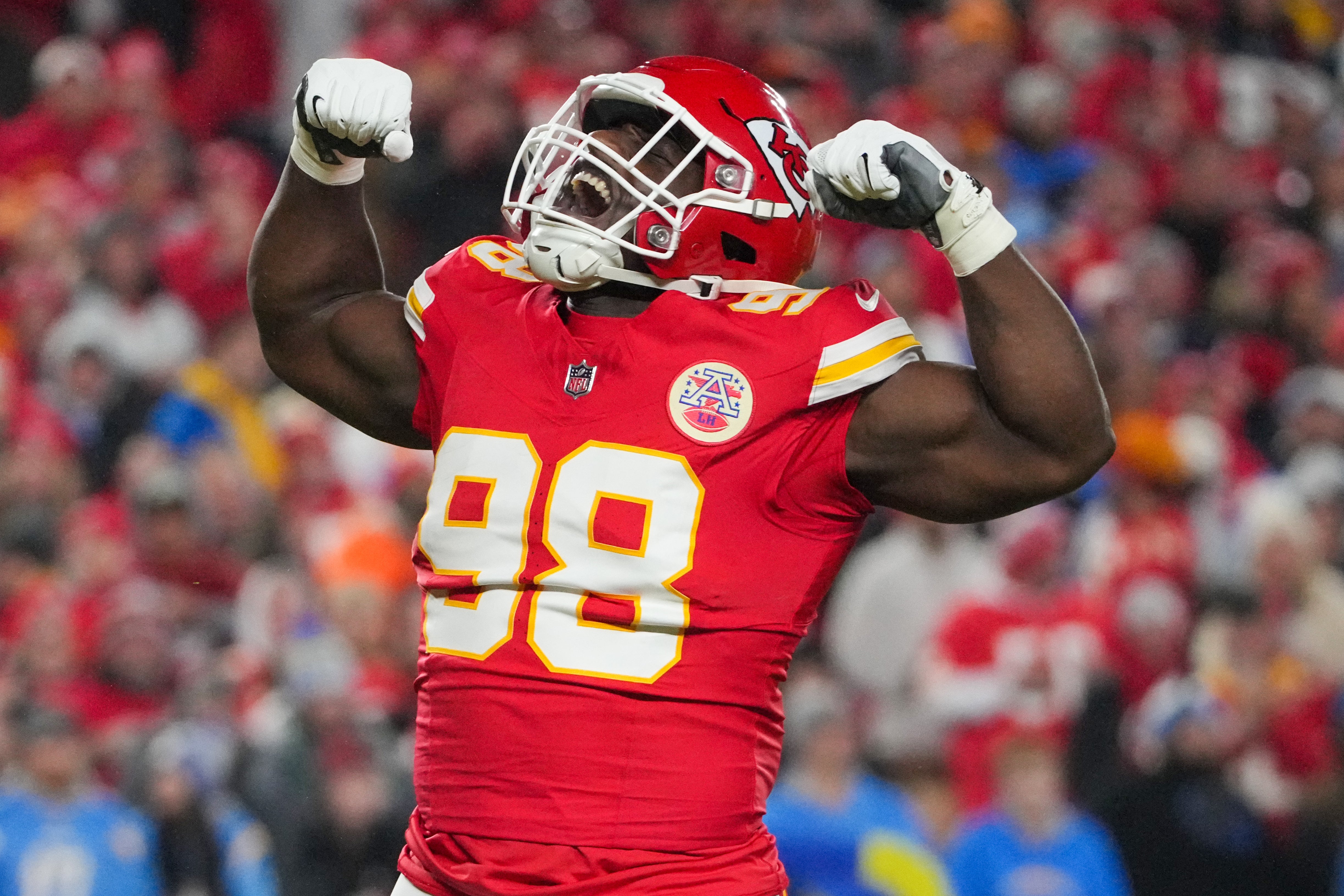 Dec 8, 2024; Kansas City, Missouri, USA; Kansas City Chiefs defensive tackle Tershawn Wharton (98) celebrates after a sack against the Los Angeles Chargers during the first half at GEHA Field at Arrowhead Stadium.