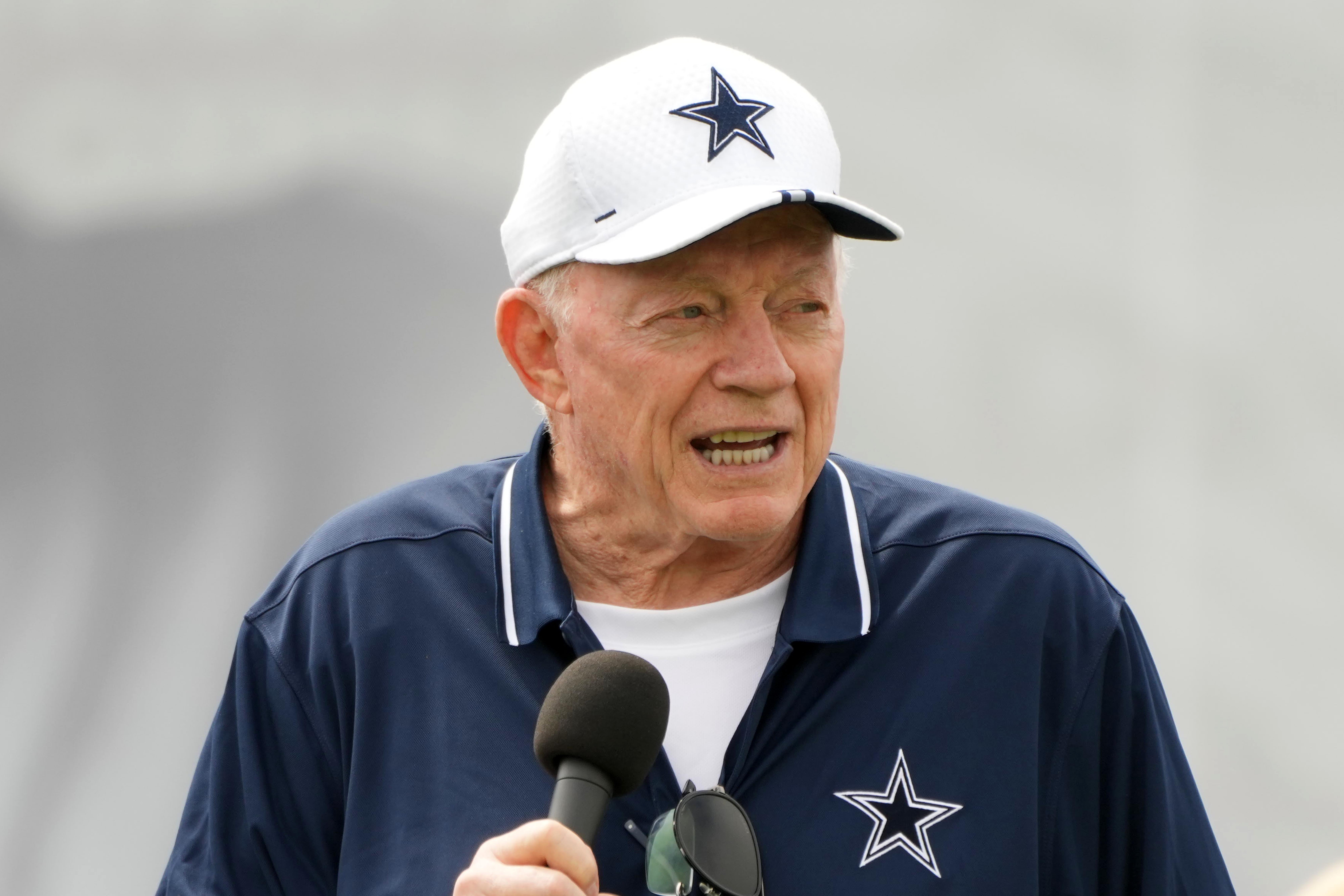 Dallas Cowboys owner Jerry Jones speaks during training camp opening ceremonies at the River Ridge Fields.