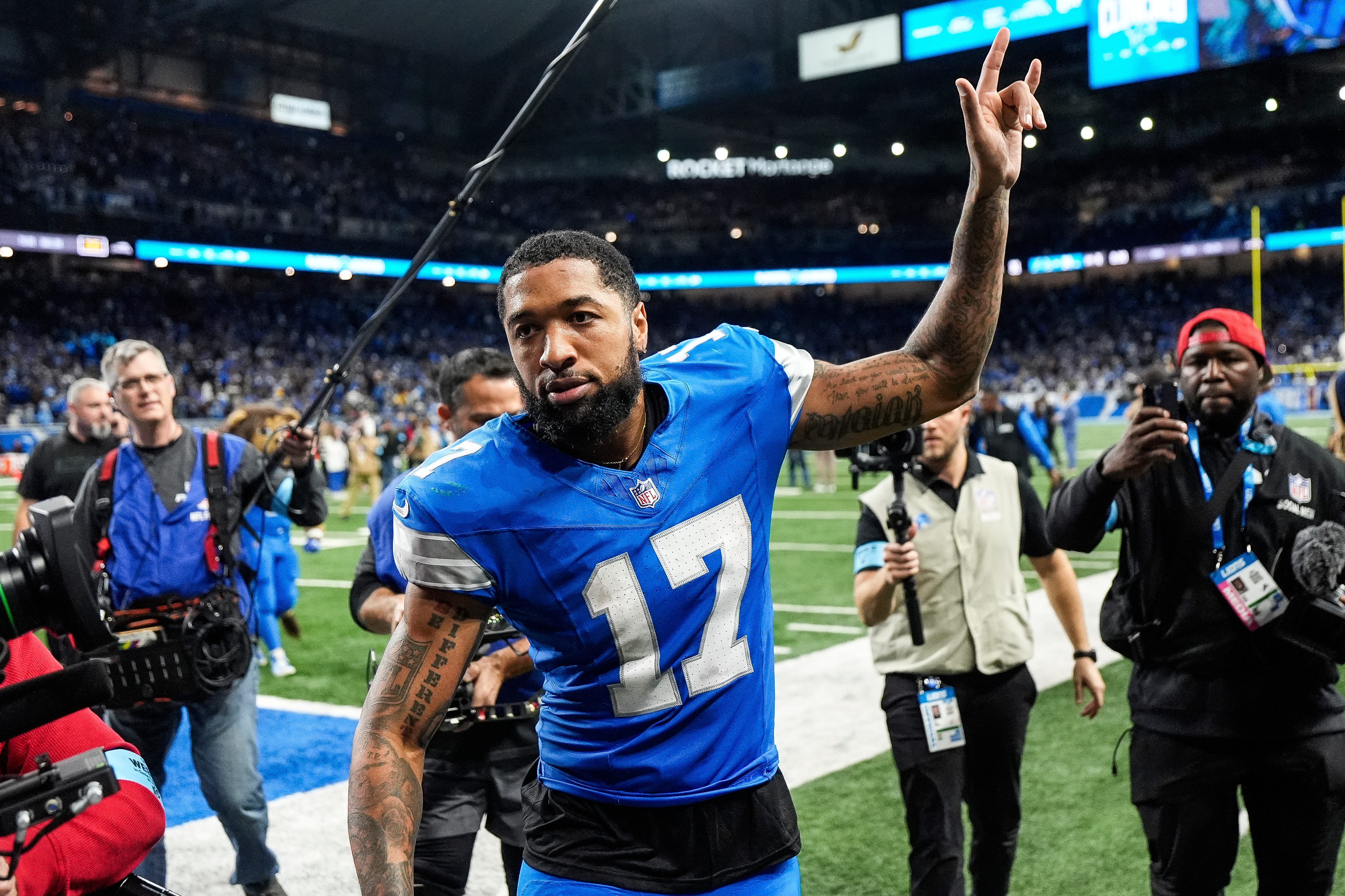 Detroit Lions wide receiver Tim Patrick (17) waves at fans as he exits the field after 34-31 win over Green Bay Packers at Ford Field in Detroit on Thursday, Dec. 5, 2024.