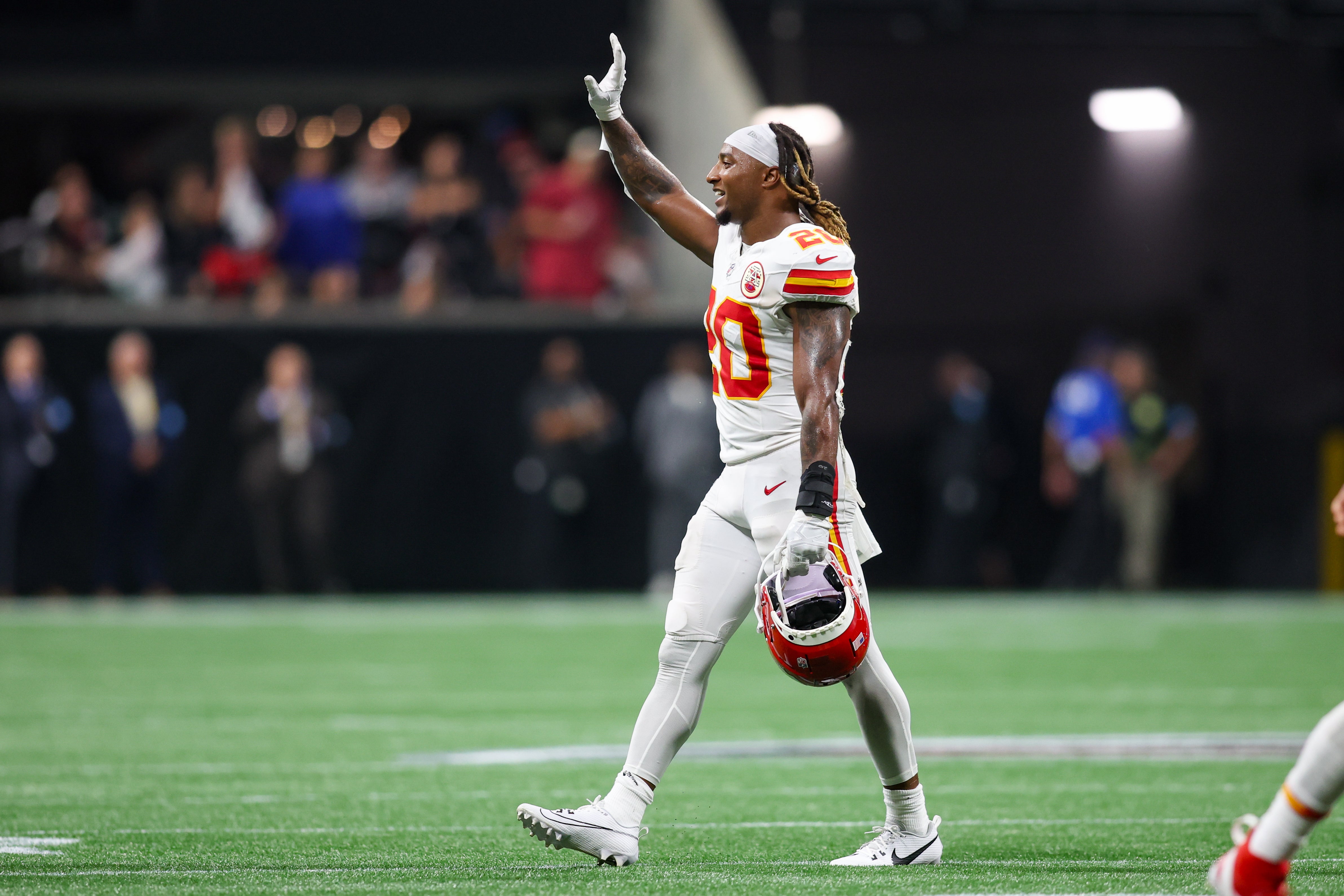 Sep 22, 2024; Atlanta, Georgia, USA; Kansas City Chiefs safety Justin Reid (20) waves to the crowd after a stop on fourth down against the Atlanta Falcons in the fourth quarter at Mercedes-Benz Stadium.