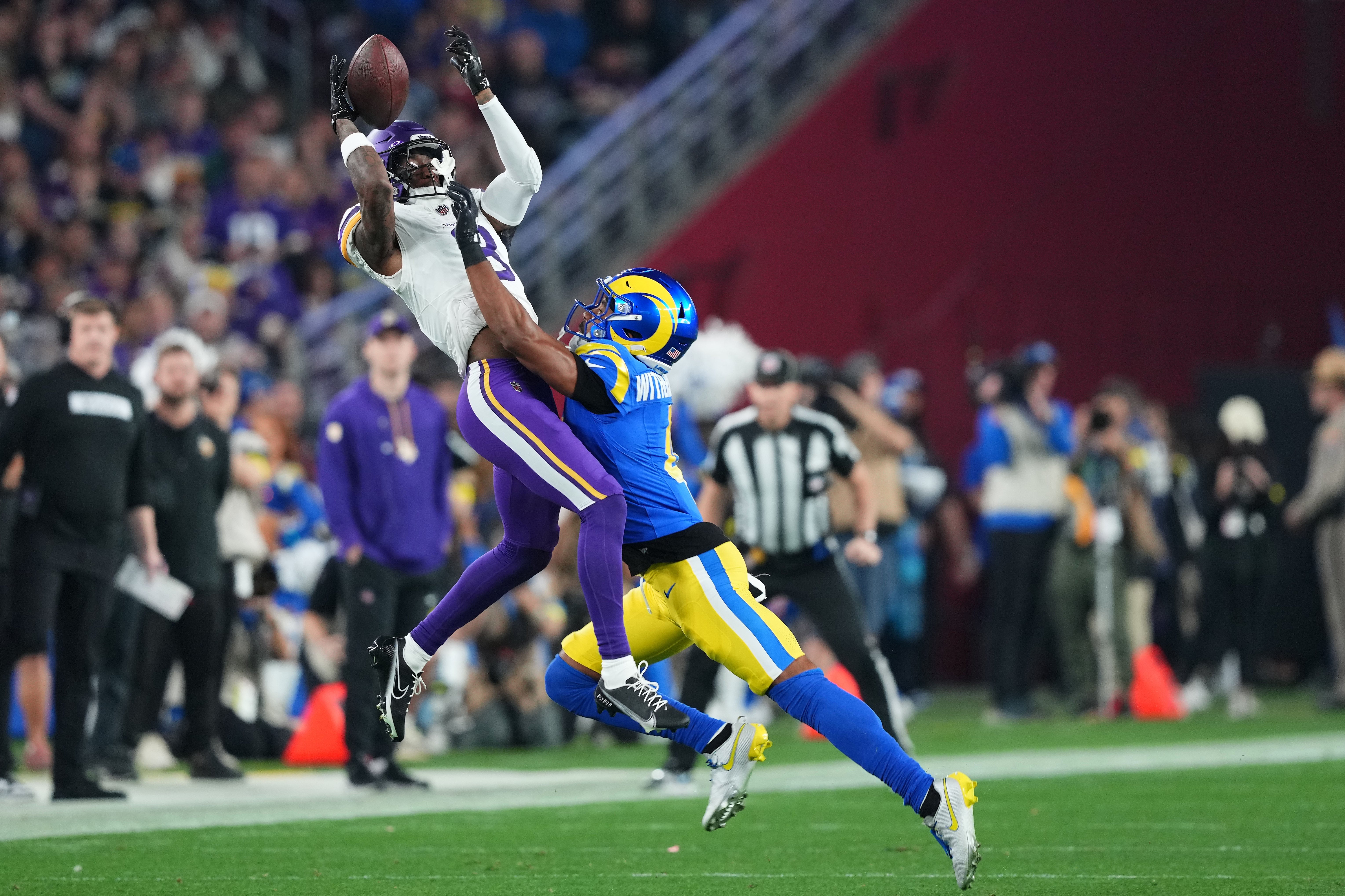 Jan 13, 2025; Glendale, AZ, USA; Minnesota Vikings wide receiver Jordan Addison (3) makes a catch against the Los Angeles Rams during the first half in an NFC wild card game at State Farm Stadium.