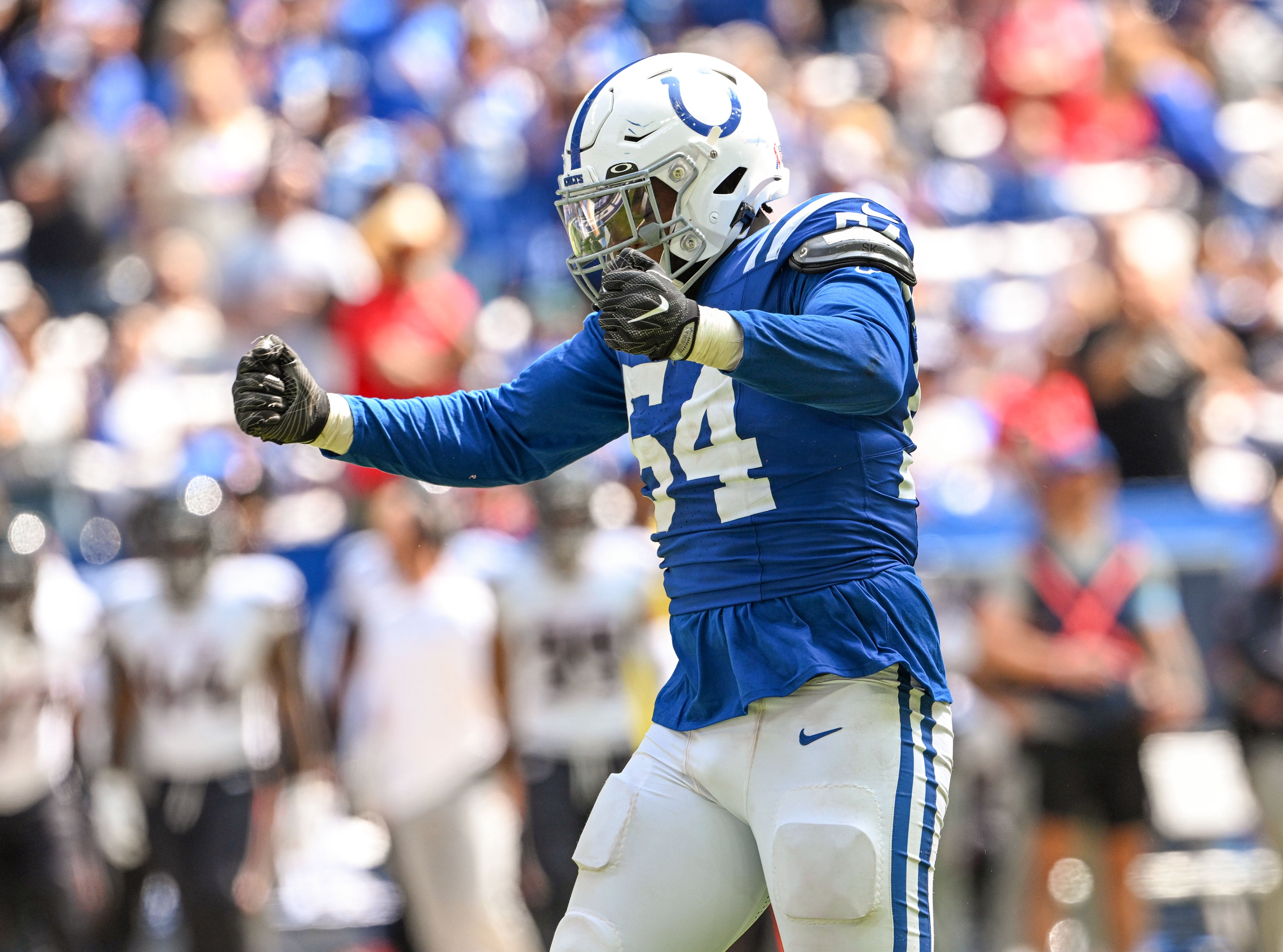 Sep 8, 2024; Indianapolis, Indiana, USA; Indianapolis Colts defensive end Dayo Odeyingbo (54) celebrates a sack during the second half against the Houston Texans at Lucas Oil Stadium.