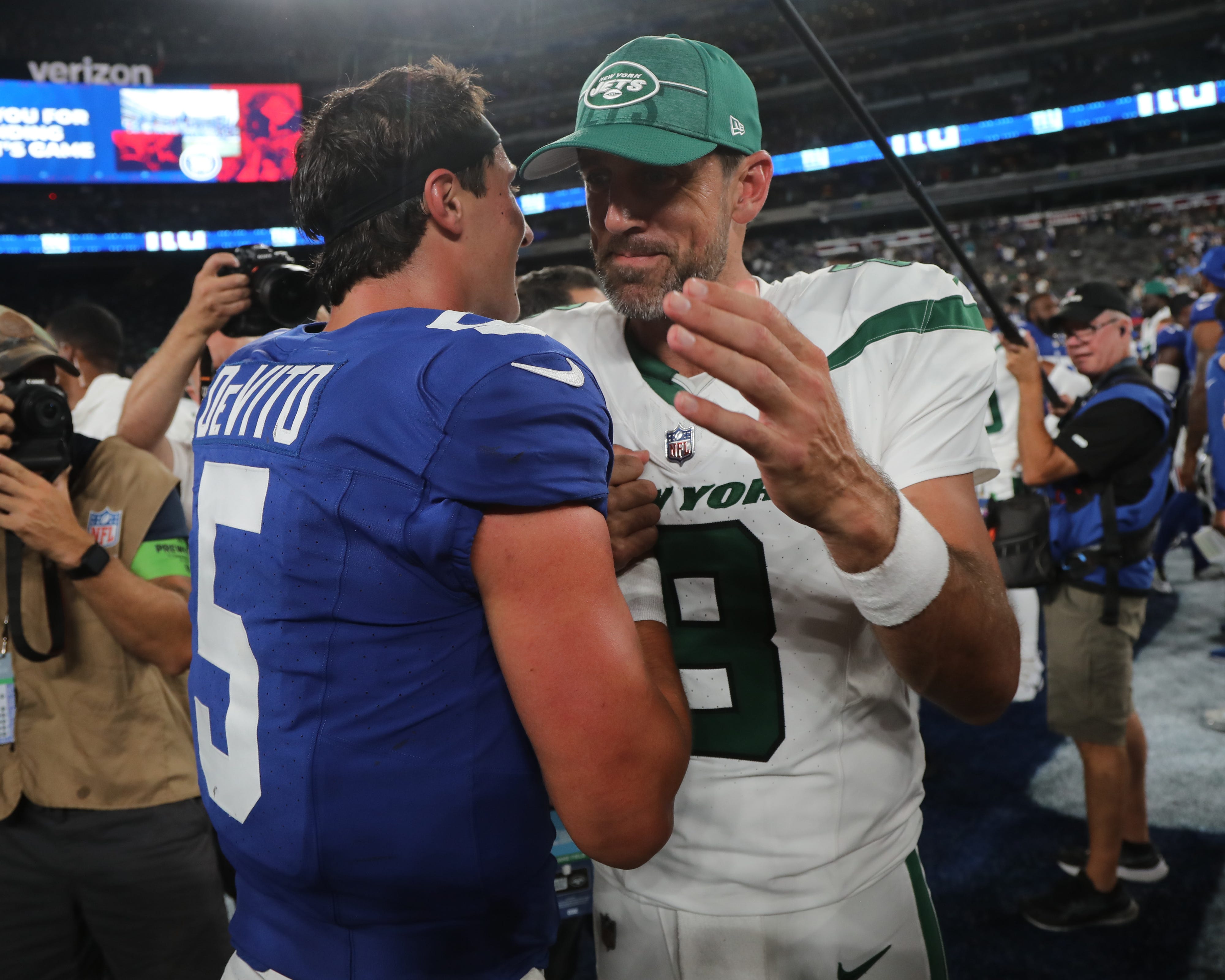 Jets quarterback Aaron Rodgers with quarterback Tommy DeVito of the Giants at the end of the game. The NY Jets against the NY Giants on August 26, 2023 at MetLife Stadium in East Rutherford, NJ, as the rivals play their final preseason game before the start of the NFL season.