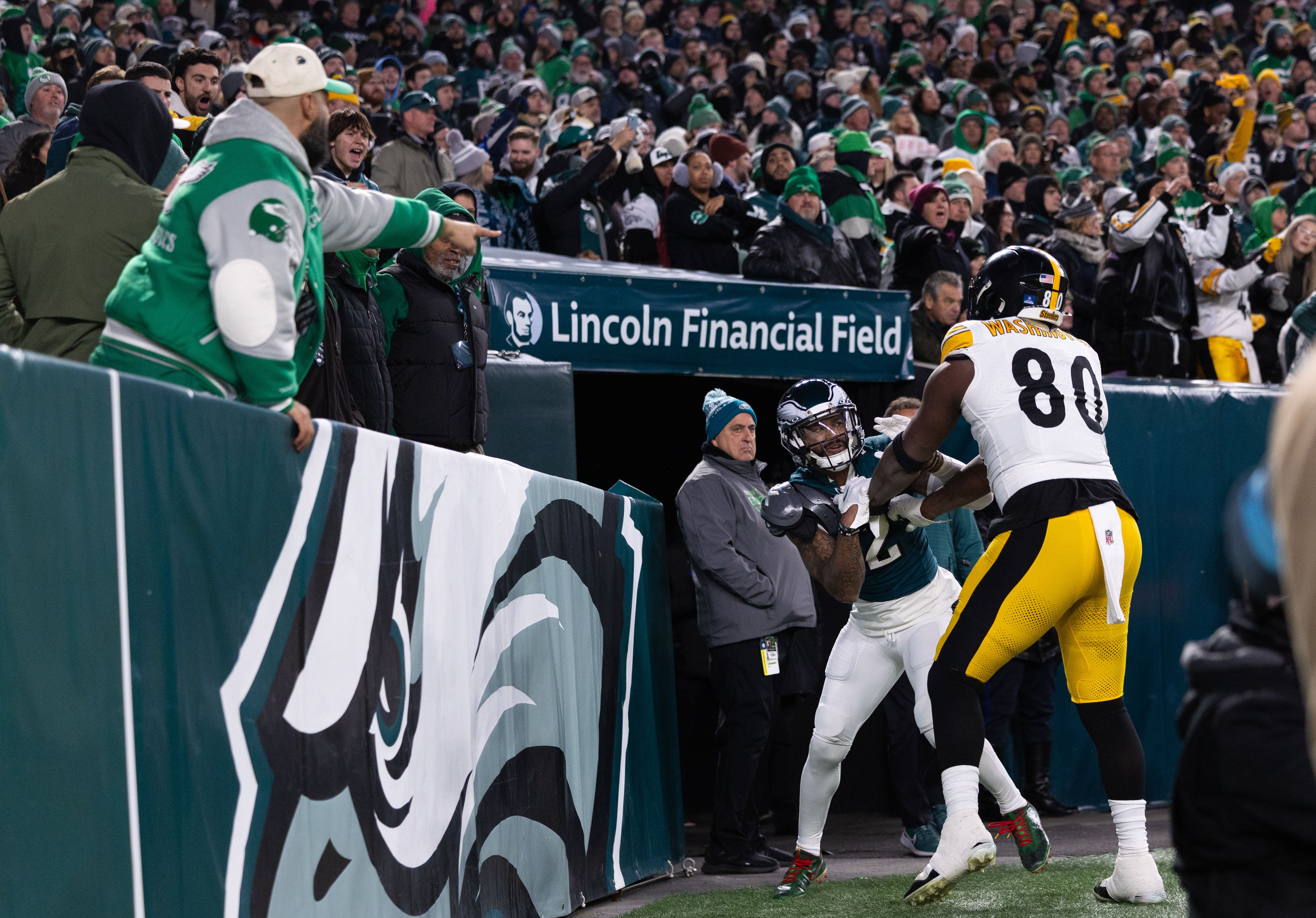 Dec 15, 2024; Philadelphia, Pennsylvania, USA; Philadelphia Eagles cornerback Darius Slay Jr. (2) and Pittsburgh Steelers tight end Darnell Washington (80) push and shove each other after a play during the first quarter at Lincoln Financial Field.