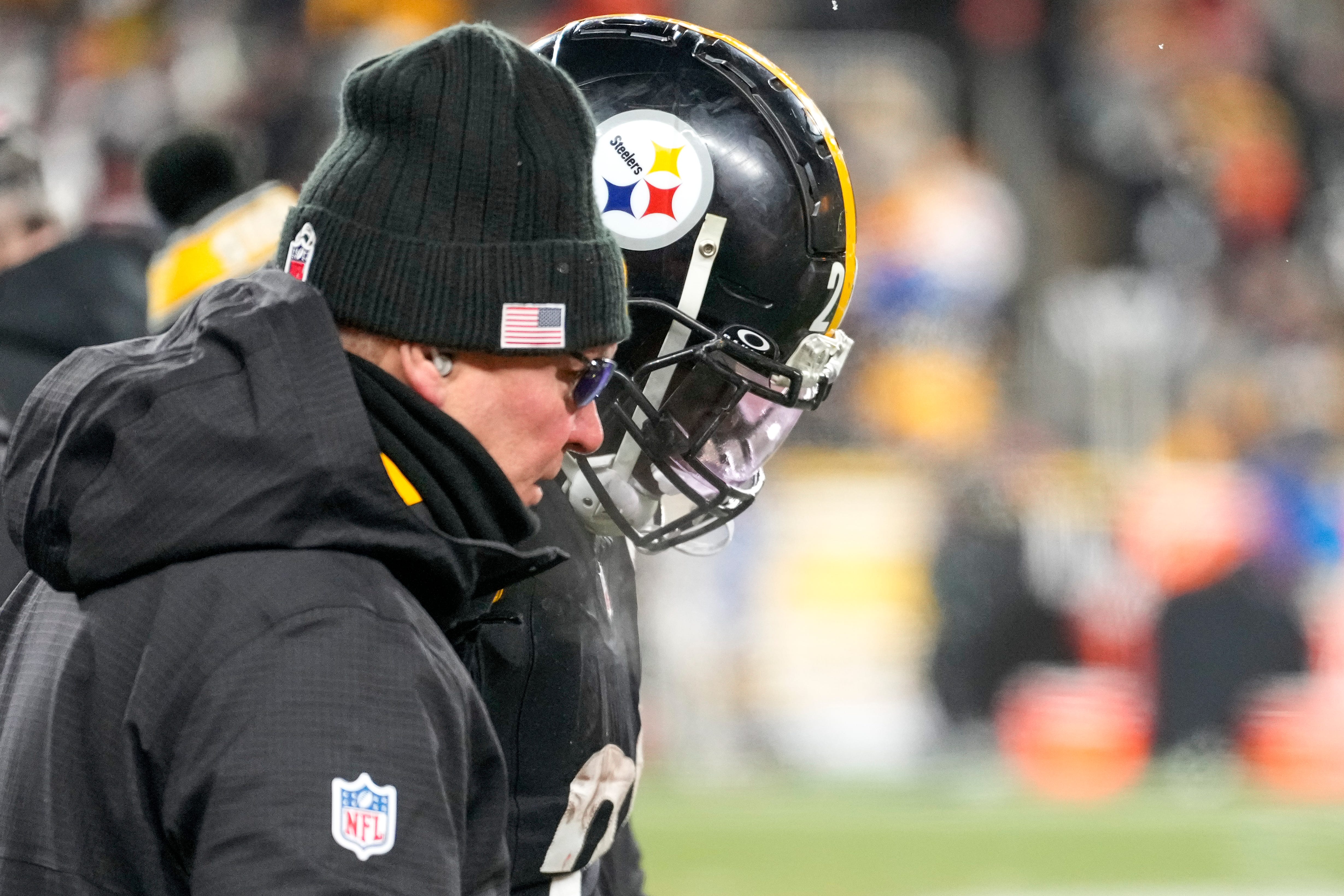 Pittsburgh Steelers running back Najee Harris (22) is taken to the exam tent with an injury in the fourth quarter of the NFL Week 18 game between the Pittsburgh Steelers and the Cincinnati Bengals at Acrisure Stadium in Pittsburgh on Saturday, Jan. 4, 2025. The Bengals won 19-17 to finish the regular season at 9-8.