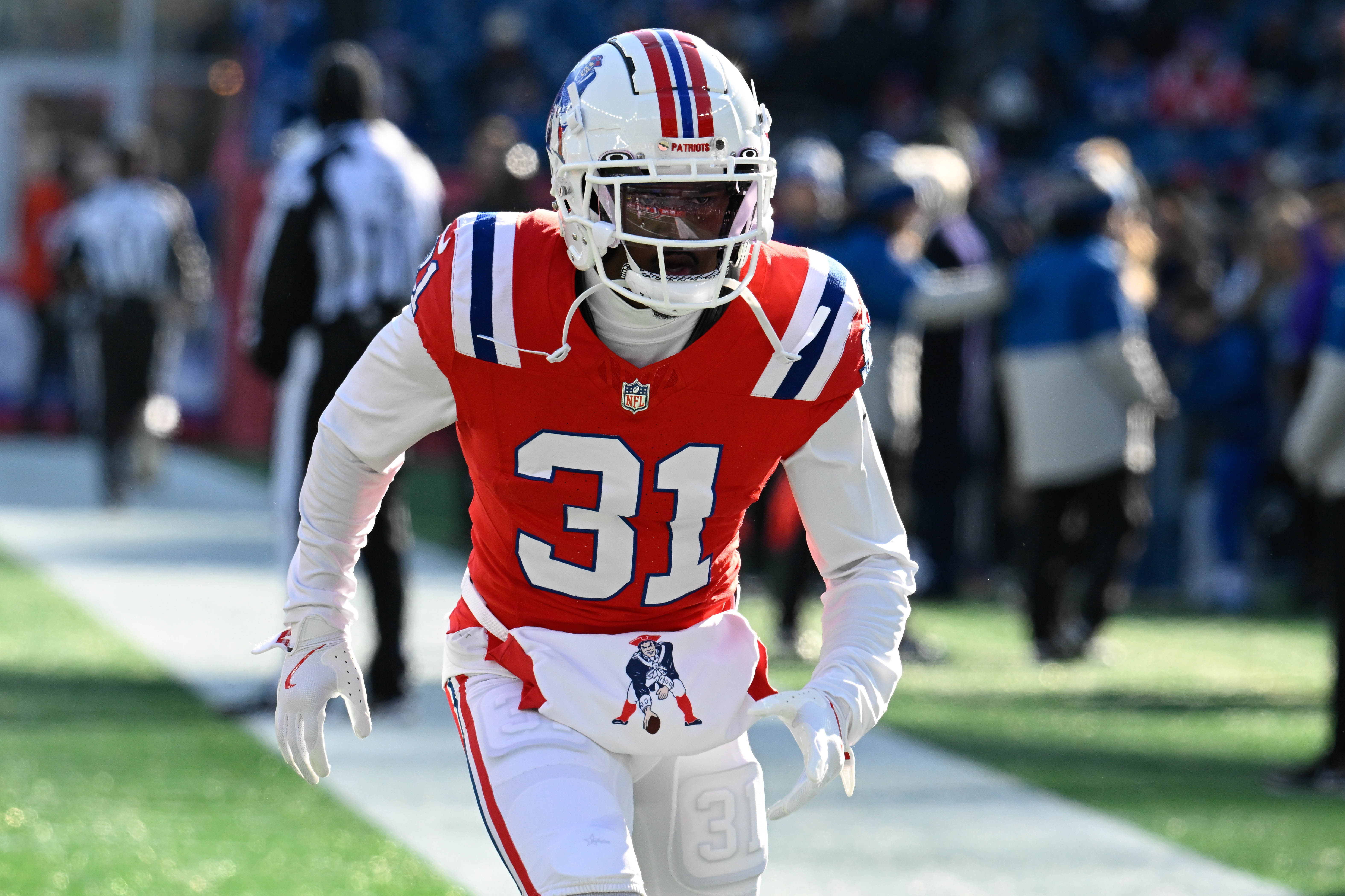 Dec 1, 2024; Foxborough, Massachusetts, USA; New England Patriots cornerback Jonathan Jones (31) warms up before a game against the Indianapolis Colts at Gillette Stadium.