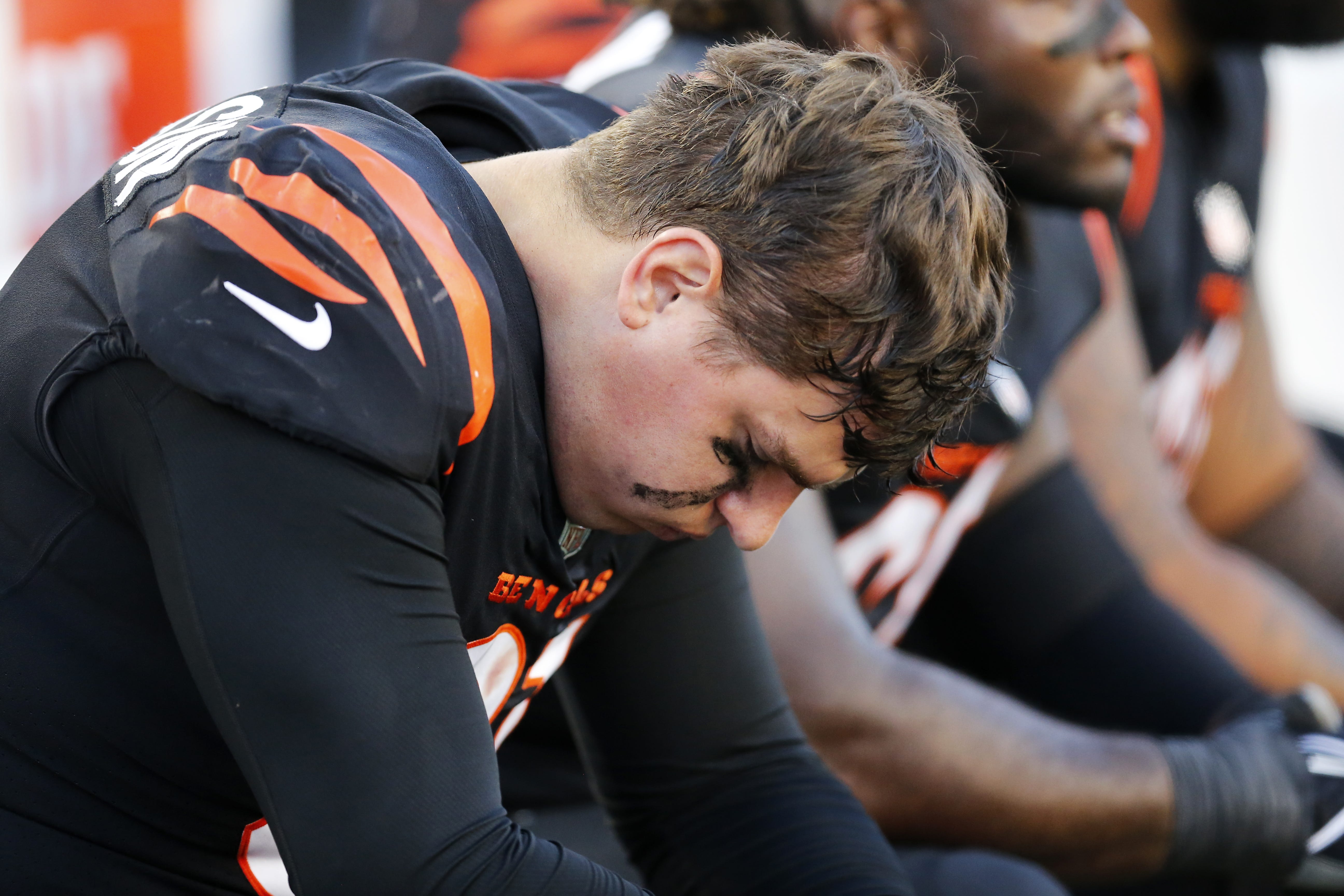 Cincinnati Bengals defensive end Trey Hendrickson (91) hangs his head on the sideline in the fourth quarter of the NFL Week 9 game between the Cincinnati Bengals and the Cleveland Browns at Paul Brown Stadium in Cincinnati on Sunday, Nov. 7, 2021. Cleveland kept a halftime lead to clinch a 41-16 win over the Bengals.