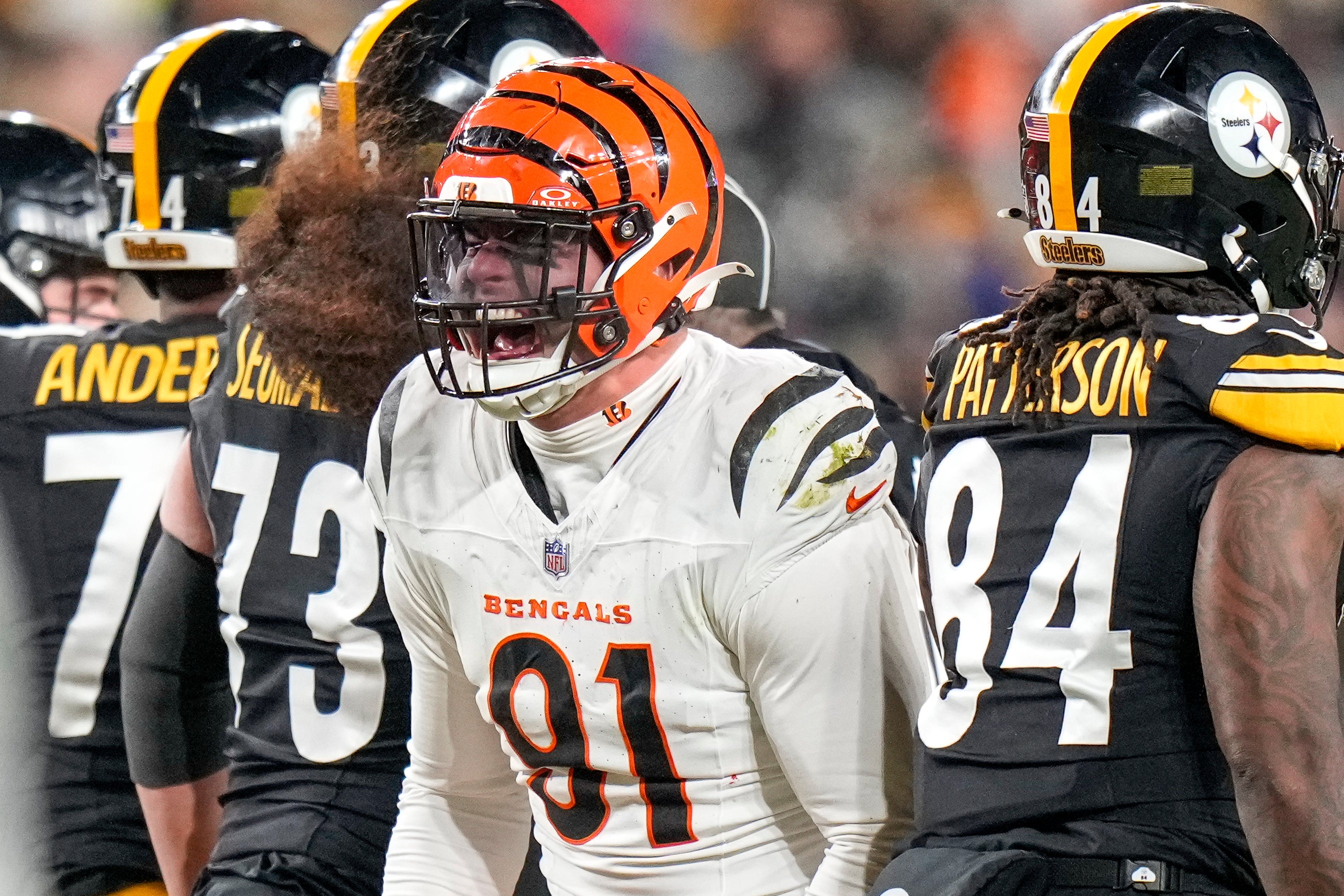 Jan 4, 2025; Pittsburgh, Pennsylvania, USA; Cincinnati Bengals defensive end Trey Hendrickson (91) celebrates a stop against the Pittsburgh Steelers in the fourth quarter at Acrisure Stadium. The Bengals won 19-17 to finish the regular season at 9-8.
