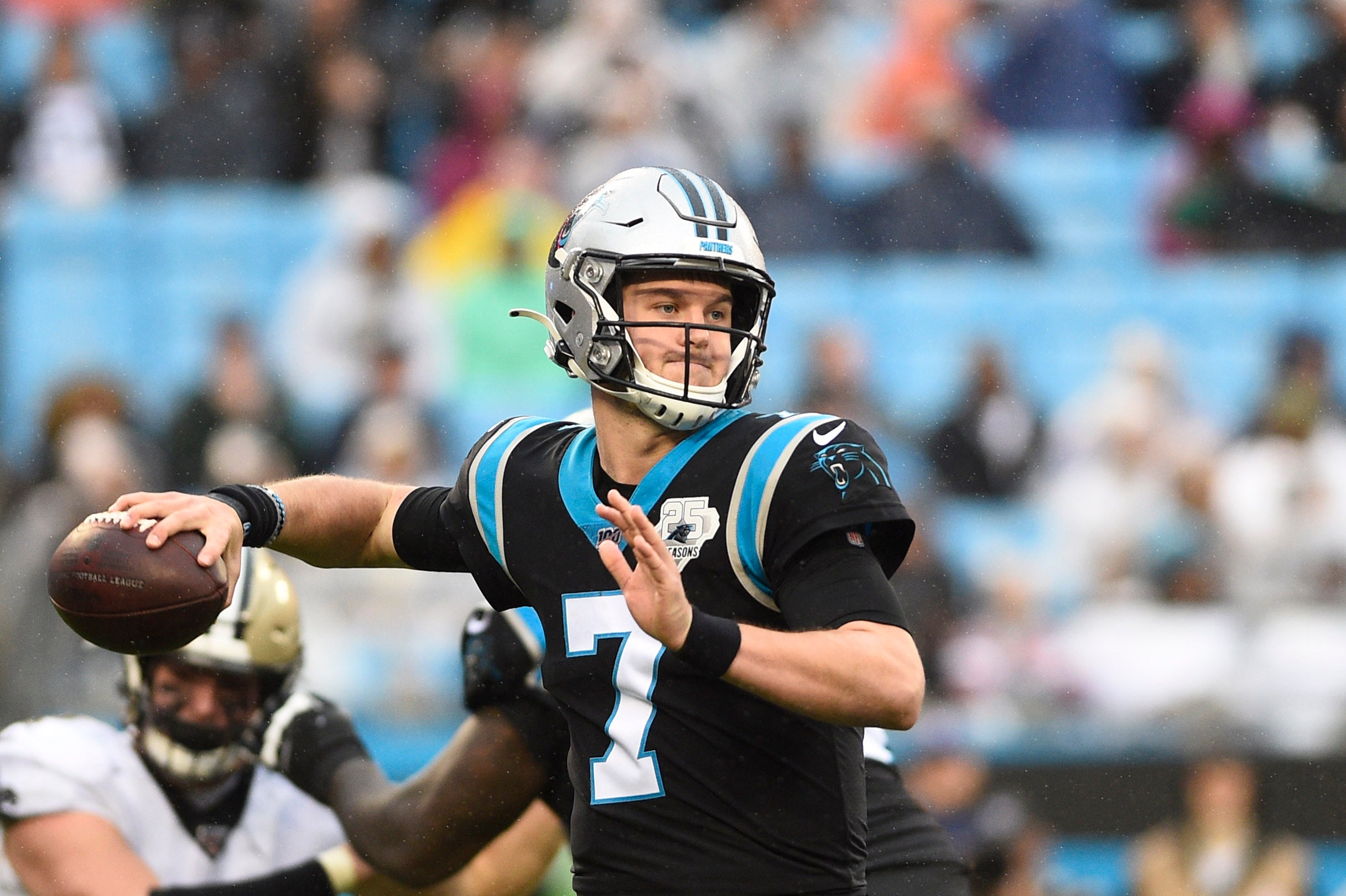 Dec 29, 2019; Charlotte, North Carolina, USA; Carolina Panthers quarterback Kyle Allen (7) looks to pass in the fourth quarter at Bank of America Stadium.
