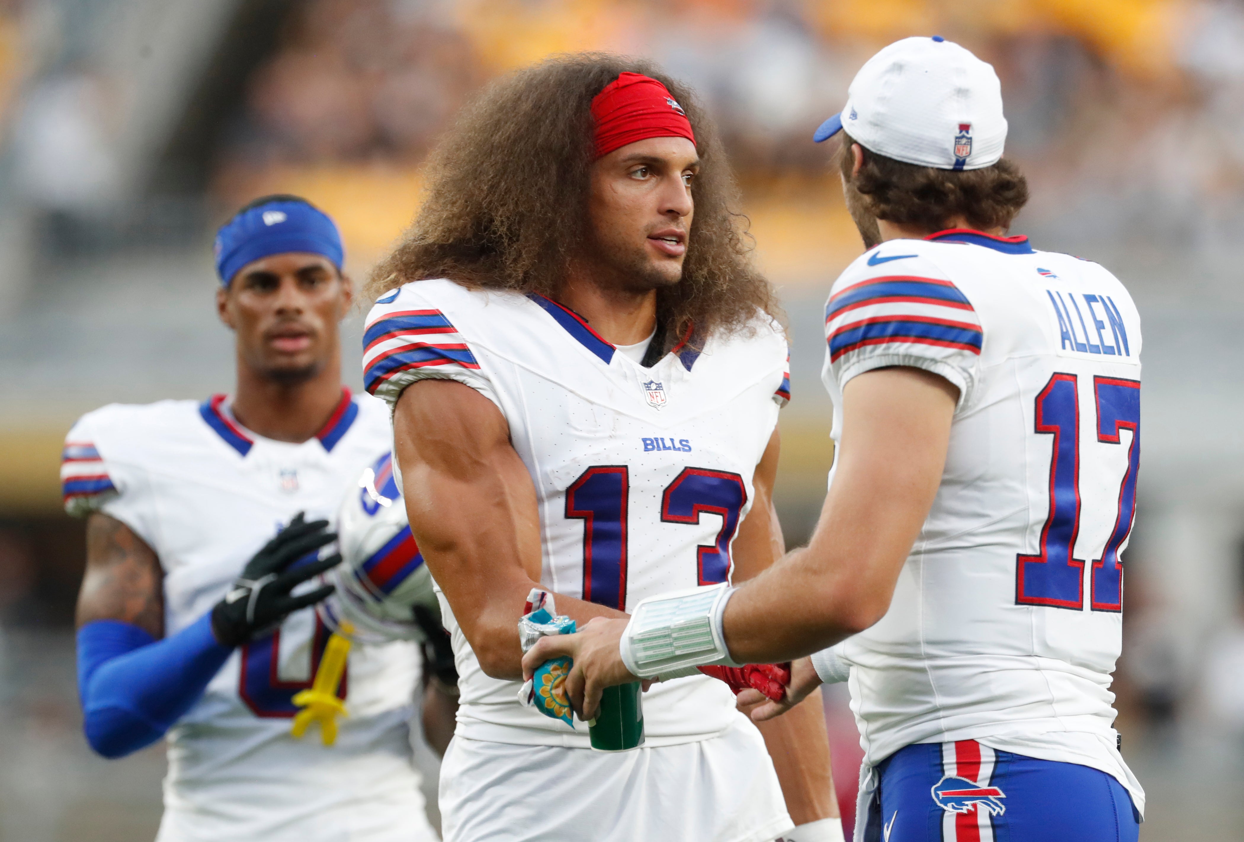 Aug 17, 2024; Pittsburgh, Pennsylvania, USA; Buffalo Bills wide receiver Mack Hollins (13) and quarterback Josh Allen (17) talk on the field against the Pittsburgh Steelers during the second quarter at Acrisure Stadium.