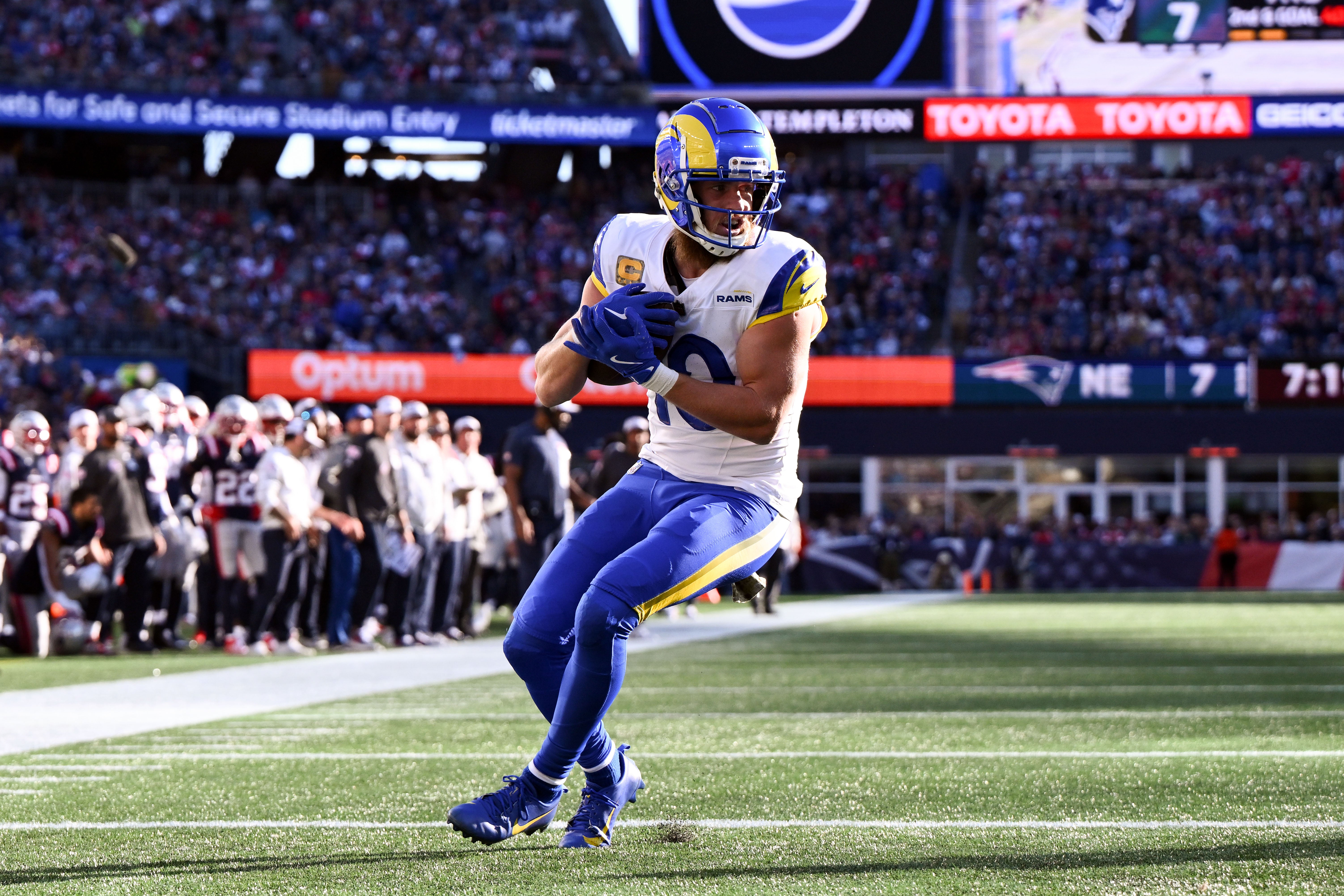 Nov 17, 2024; Foxborough, Massachusetts, USA; Los Angeles Rams wide receiver Cooper Kupp (10) scores a touchdown against the New England Patriots during the first half at Gillette Stadium.