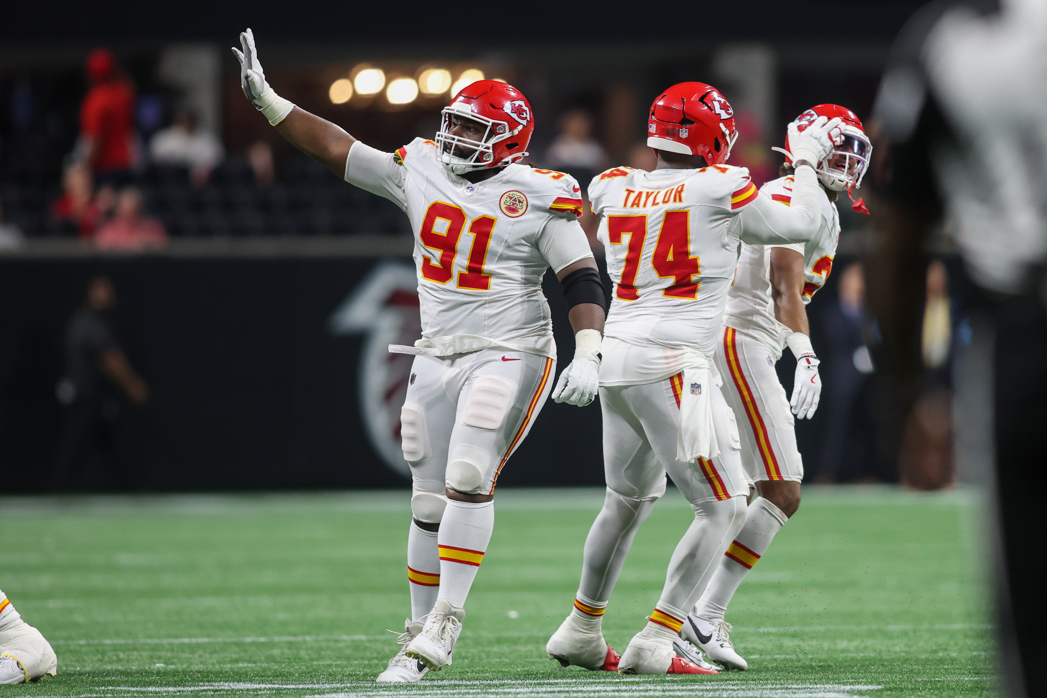 Sep 22, 2024; Atlanta, Georgia, USA; Kansas City Chiefs defensive tackle Derrick Nnadi (91) waves to the crowd after a stop on fourth down against the Atlanta Falcons in the fourth quarter at Mercedes-Benz Stadium.