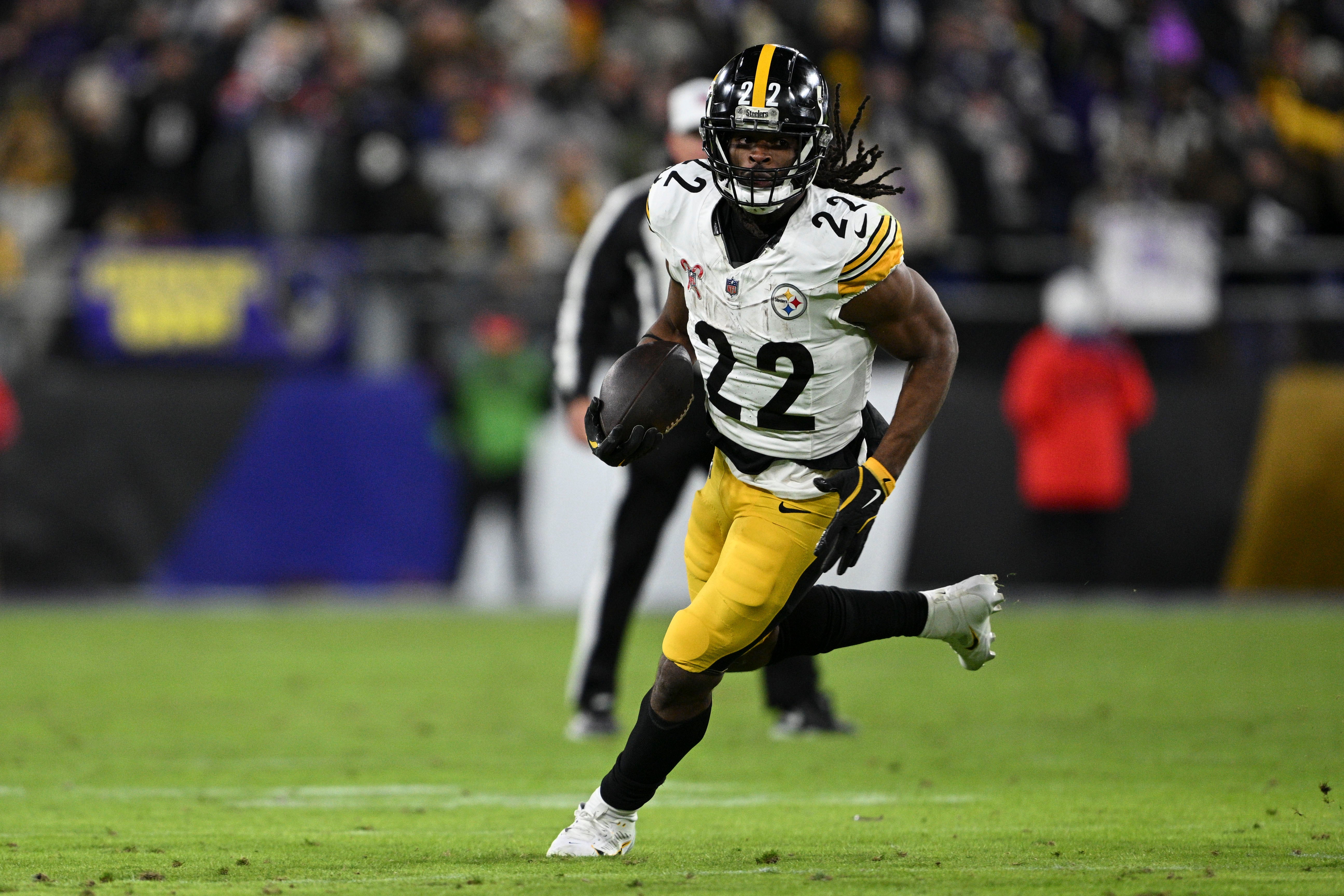 Dec 21, 2024; Baltimore, Maryland, USA; Pittsburgh Steelers running back Najee Harris (22) rushes during the second half against the Baltimore Ravens at M&T Bank Stadium.