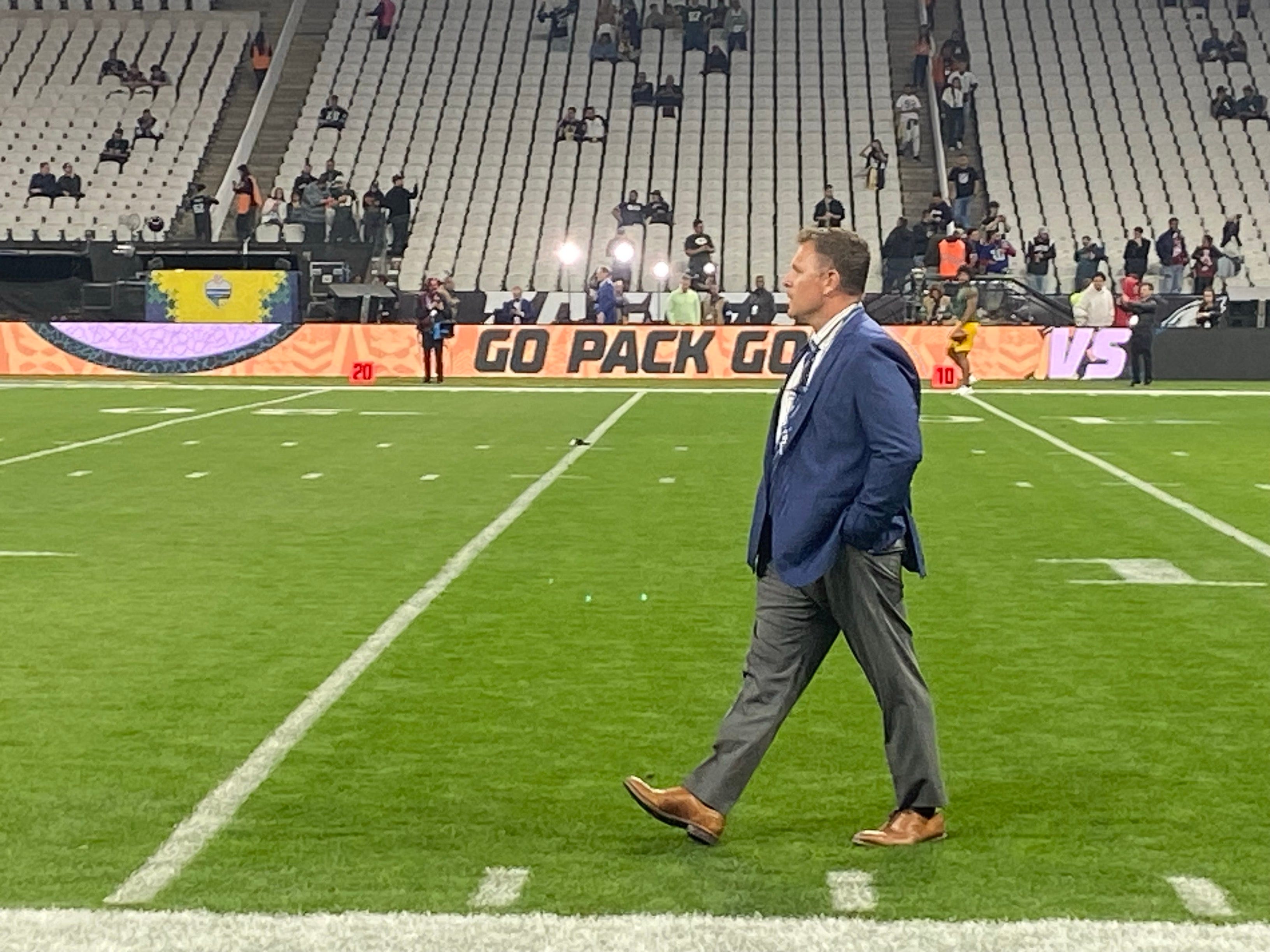Green Bay Packers general manager Brian Gutekunst walks on the field pre-game at Arena Corinthians in São Paulo, Brazil, on Friday, Sept. 6, 2024.