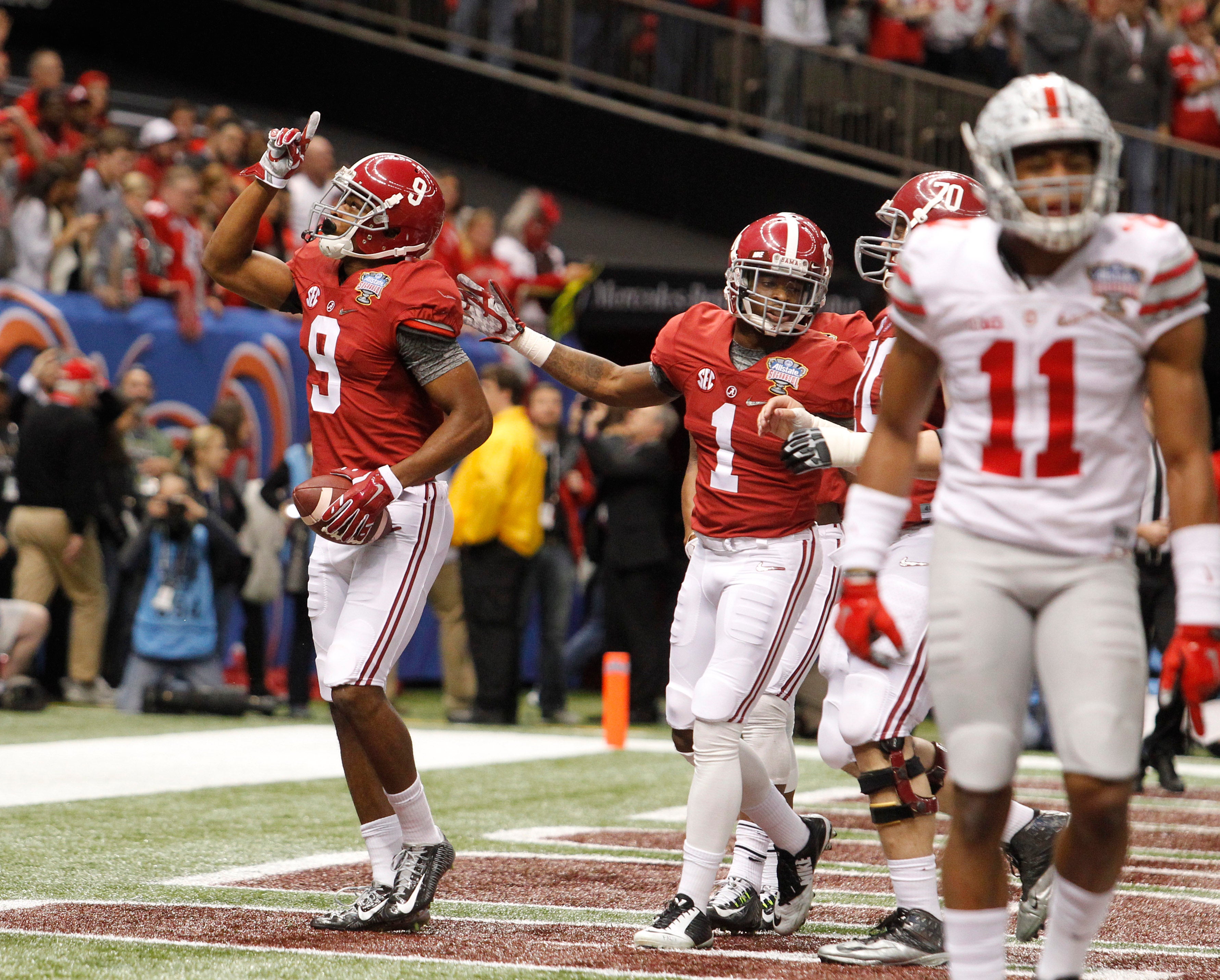 Alabama Crimson Tide wide receiver Amari Cooper (9) reacts after scoring a touchdown against the Ohio State Buckeyes in the fourth quarter of the 2015 Sugar Bowl at Mercedes-Benz Superdome. Ohio State Buckeyes beat the against the Alabama Crimson Tide, 42-35.