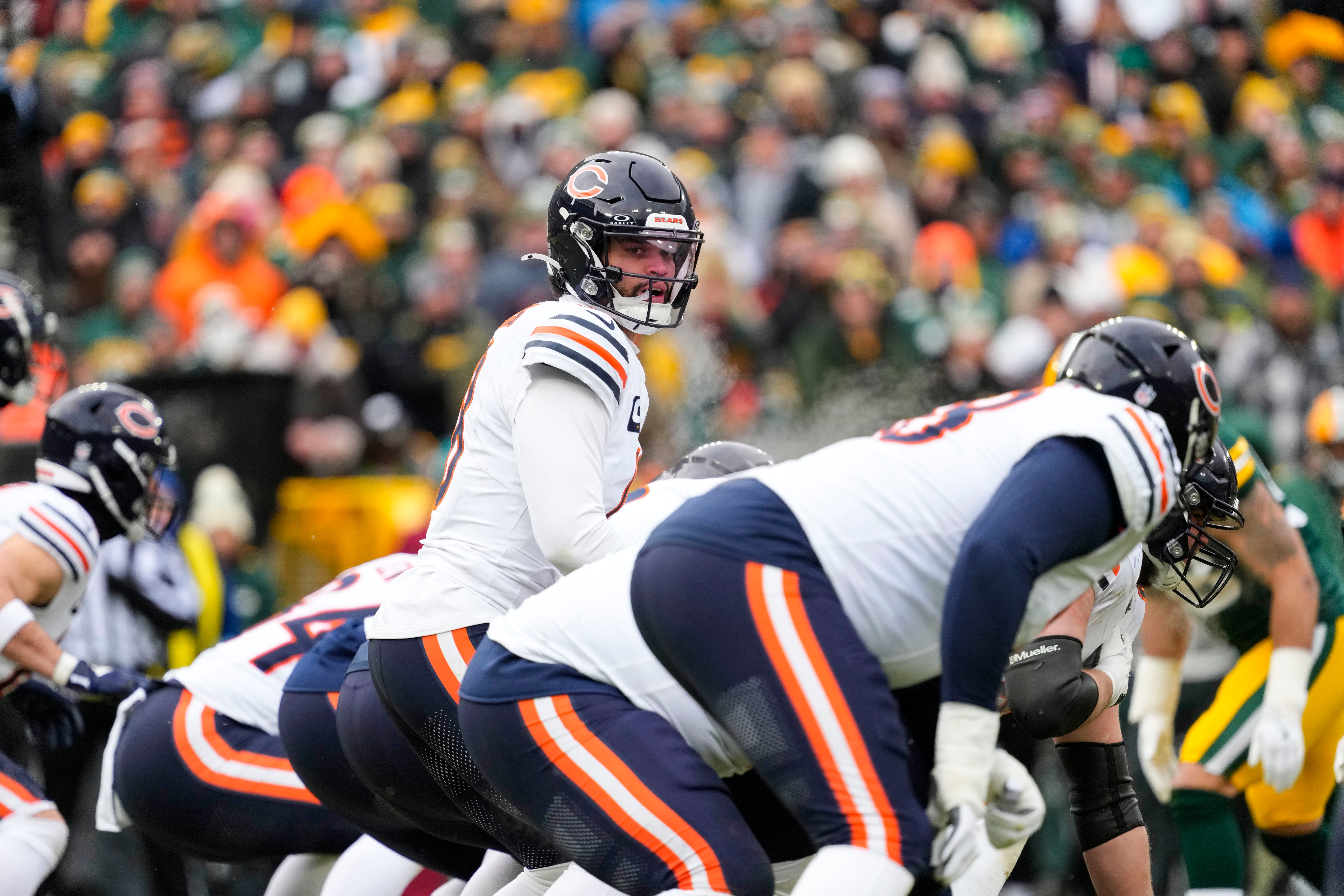 Jan 5, 2025; Green Bay, Wisconsin, USA; Chicago Bears quarterback Caleb Williams (18) during the game against the Chicago Bears at Lambeau Field.