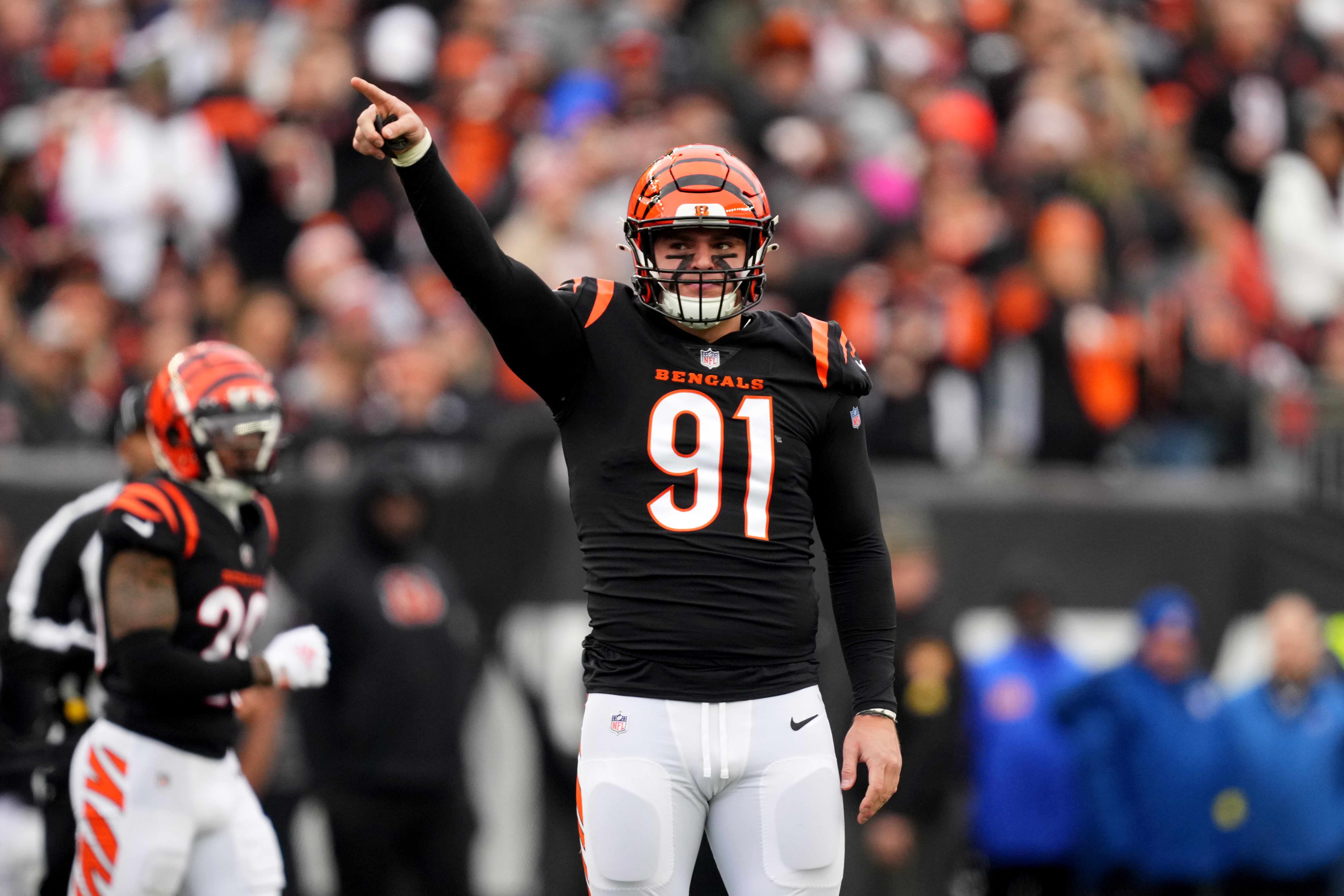 Dec 11, 2022; Cincinnati, Ohio, USA; Cincinnati Bengals defensive end Trey Hendrickson (91) signals for a penalty against the Cleveland Browns in the first quarter at Paycor Stadium.