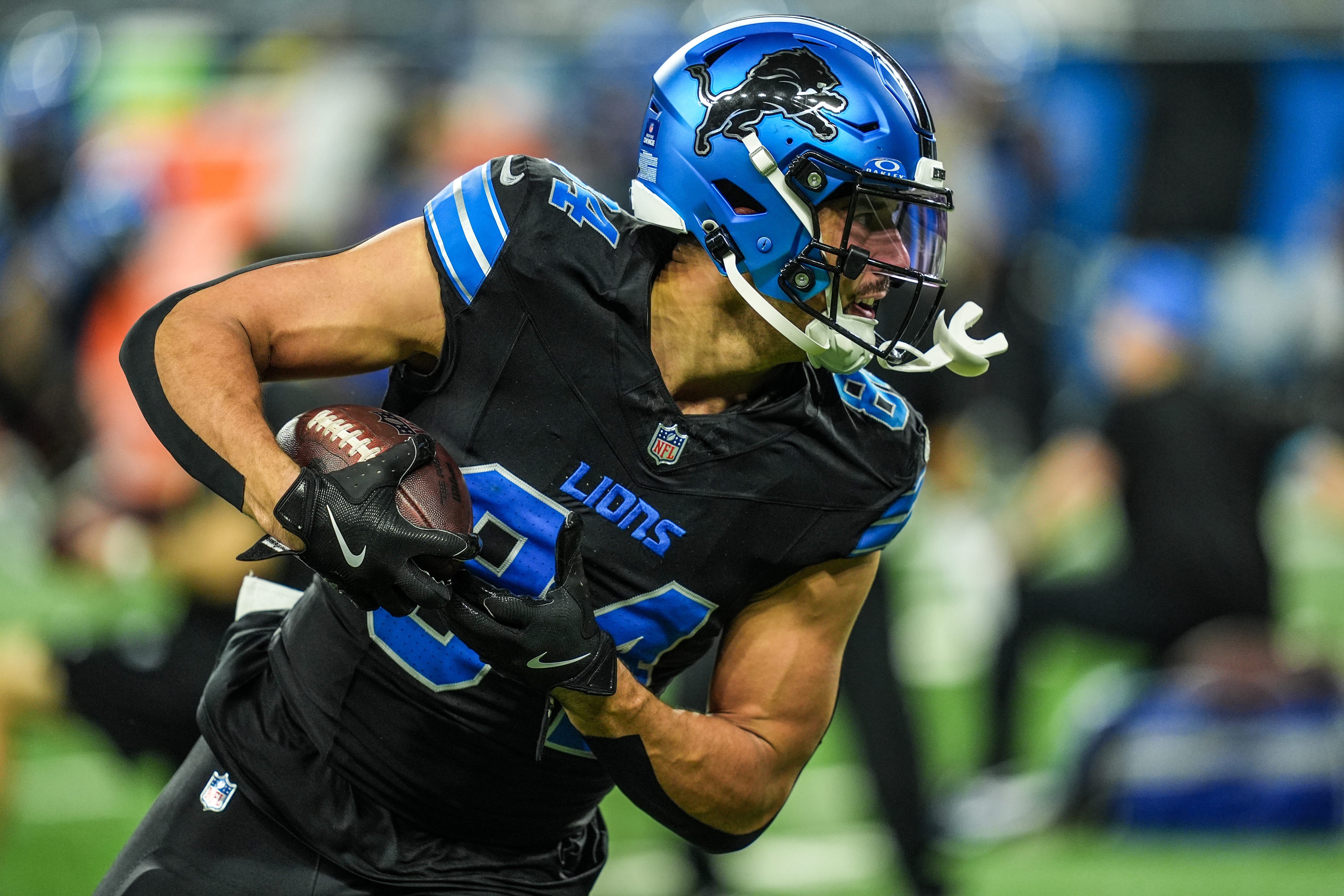 Detroit Lions tight end Shane Zylstra (84) catches a pass during warmups at Ford Field in Detroit on Sunday, Dec. 15, 2024.