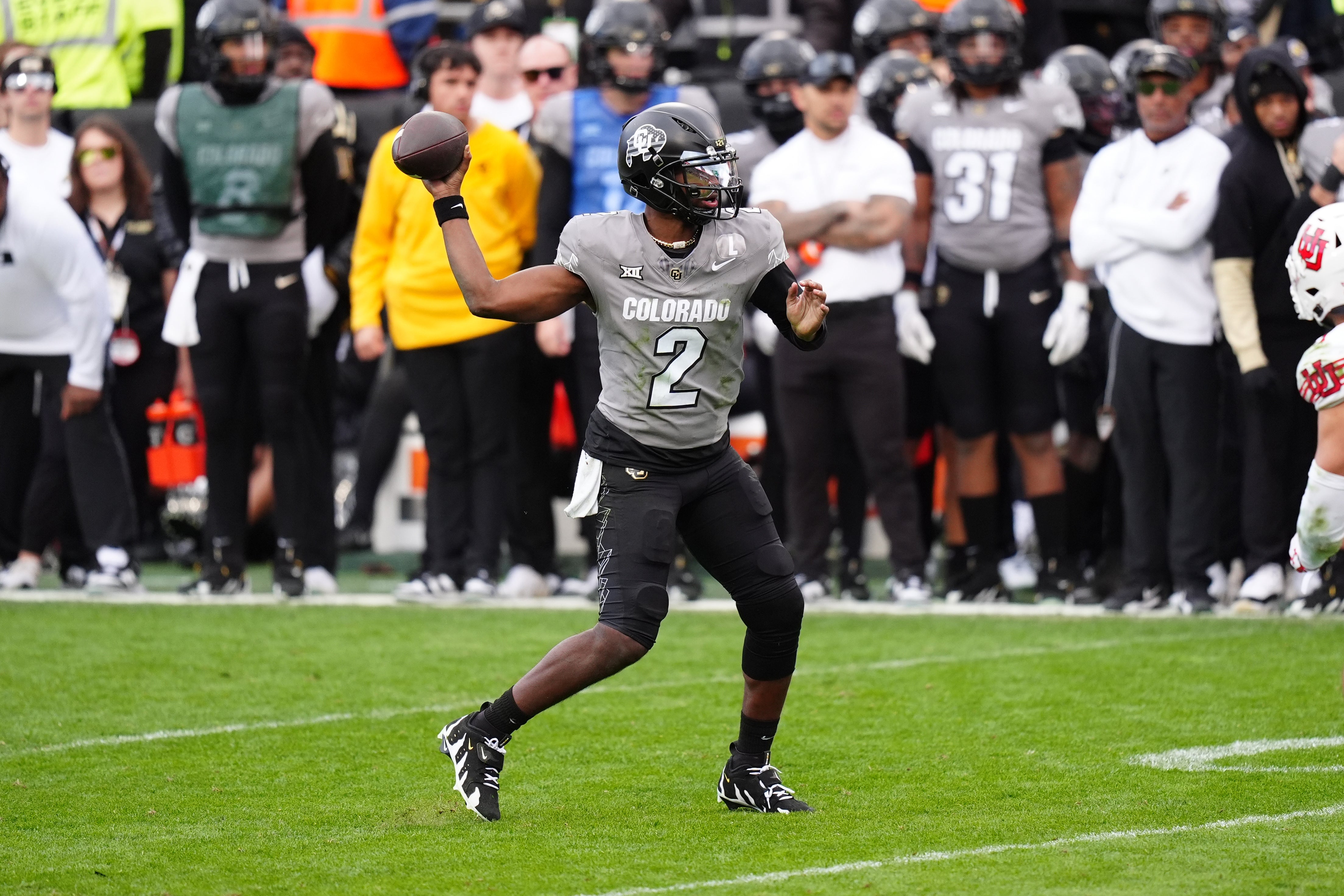 Colorado Buffaloes quarterback Shedeur Sanders (2) prepares to pass in the second half against the Utah Utes at Folsom Field. 