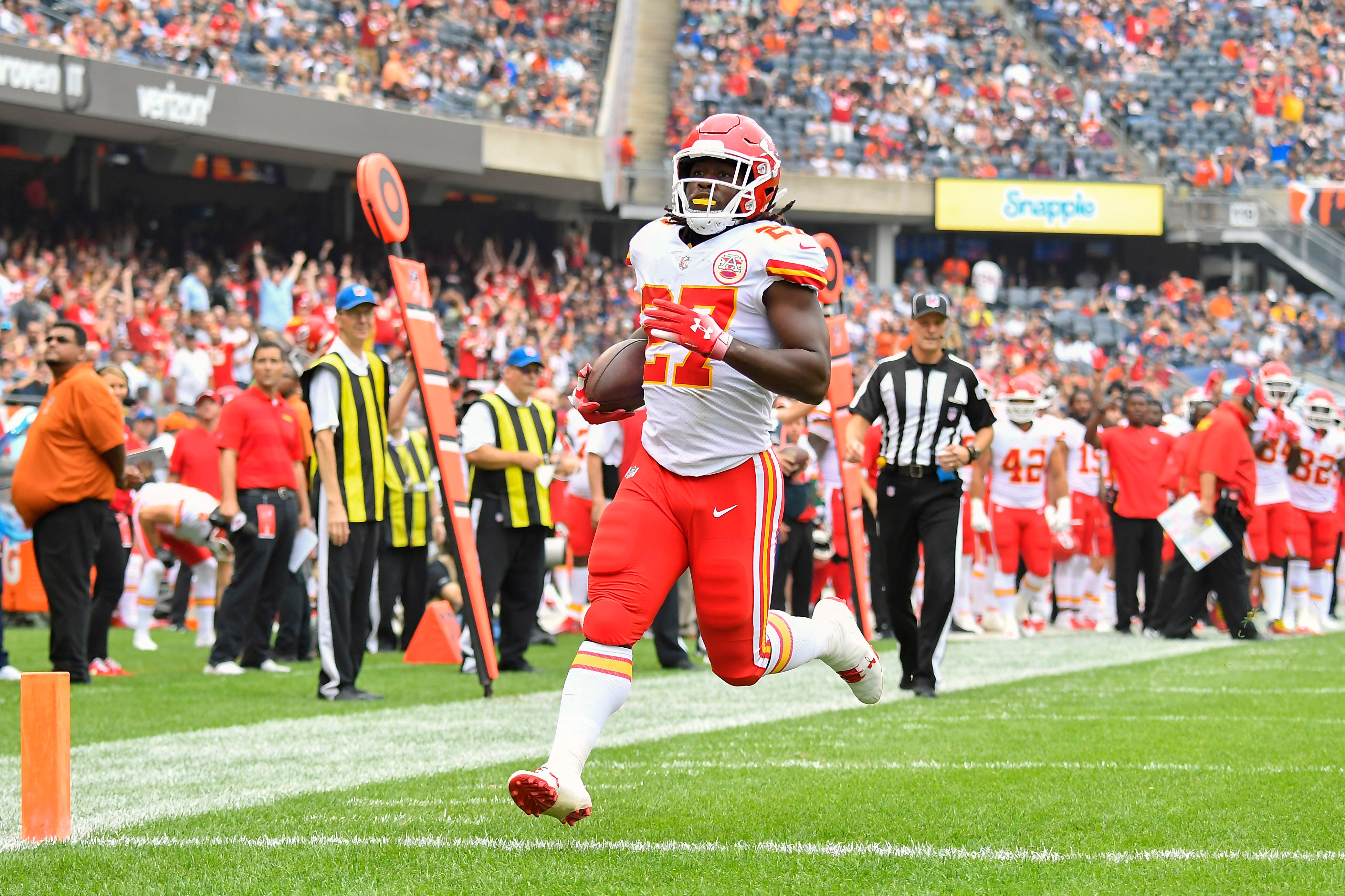 Aug 25, 2018; Chicago, IL, USA; Kansas City Chiefs running back Kareem Hunt (27) runs in for a touchdown against the Chicago Bears in the first quarter at Soldier Field.