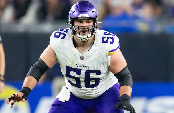 Jan 13, 2025; Glendale, AZ, USA; Minnesota Vikings center Garrett Bradbury (56) against the Los Angeles Rams during an NFC wild card game at State Farm Stadium.
