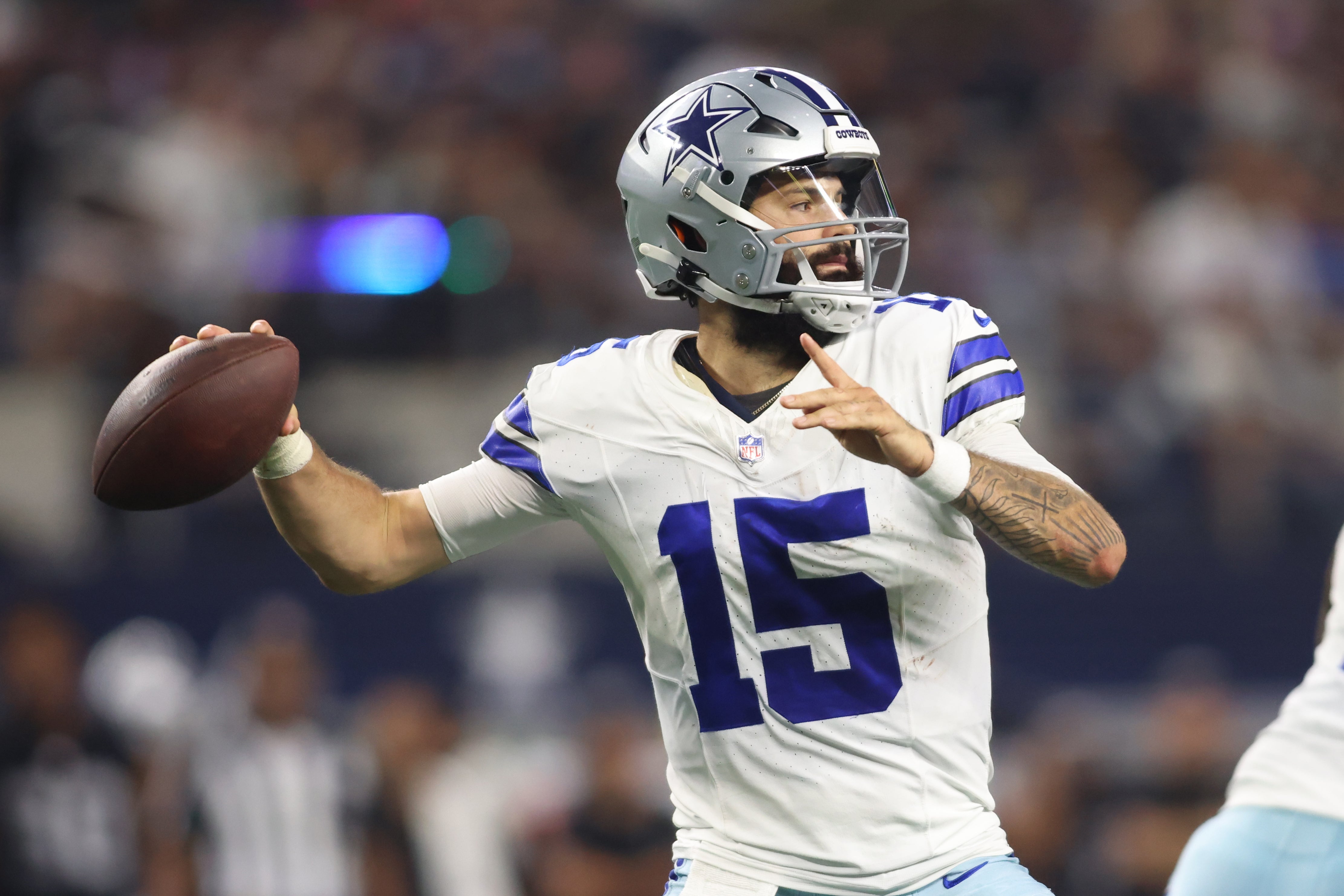 Aug 26, 2023; Arlington, Texas, USA; Dallas Cowboys quarterback Will Grier (15) throws a pass in the fourth quarter against the Las Vegas Raiders at AT&T Stadium.
