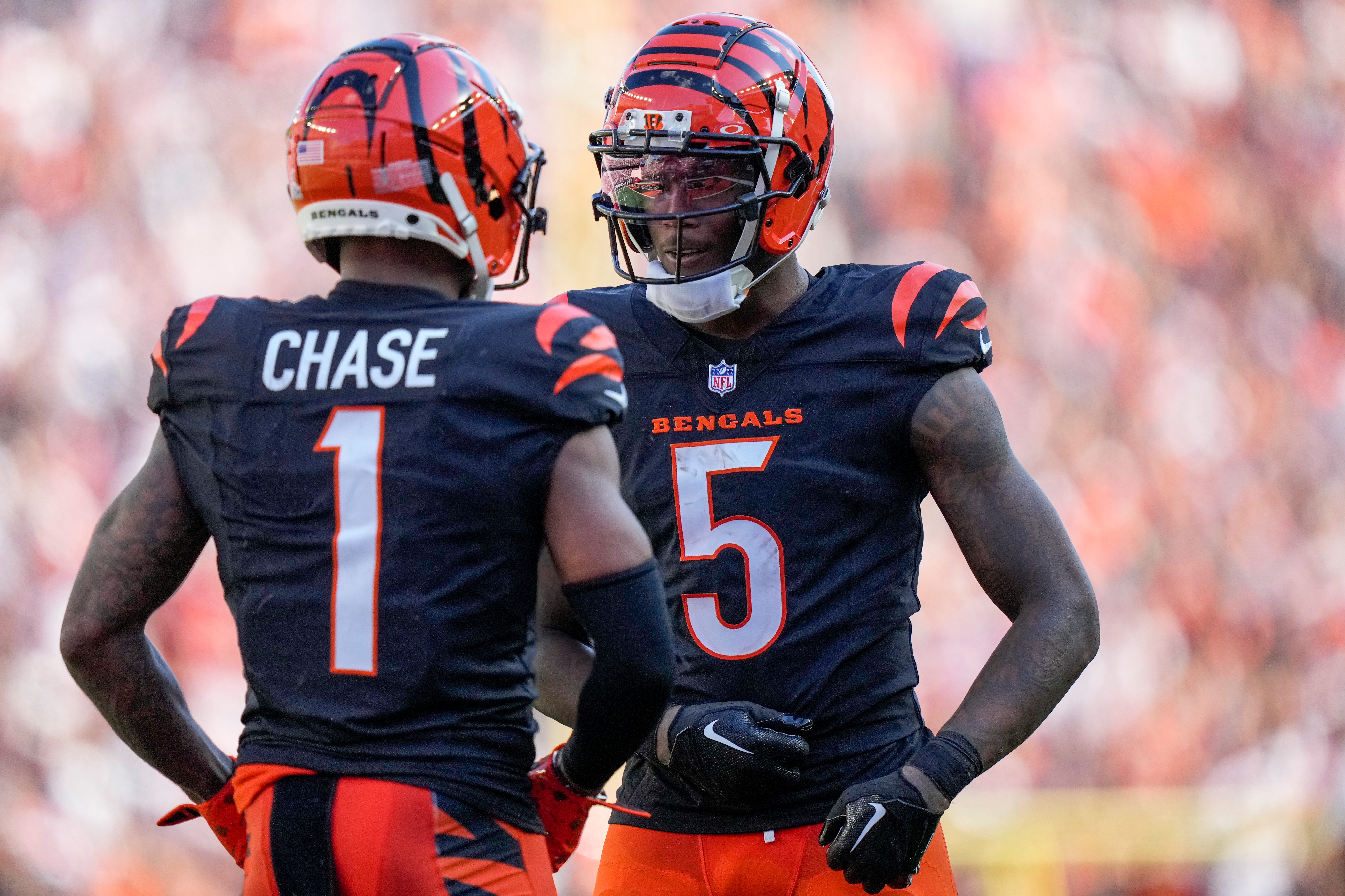 Cincinnati Bengals wide receiver Ja'Marr Chase (1) and Tee Higgins (5) celebrate the Chase touchdown in the fourth quarter of the NFL Week 5 game between the Cincinnati Bengals and Baltimore Ravens at Paycor Stadium in downtown Cincinnati on Sunday, Oct. 6, 2024. The Bengals fell to 1-4 on the season with a 41-38 loss to the Ravens.