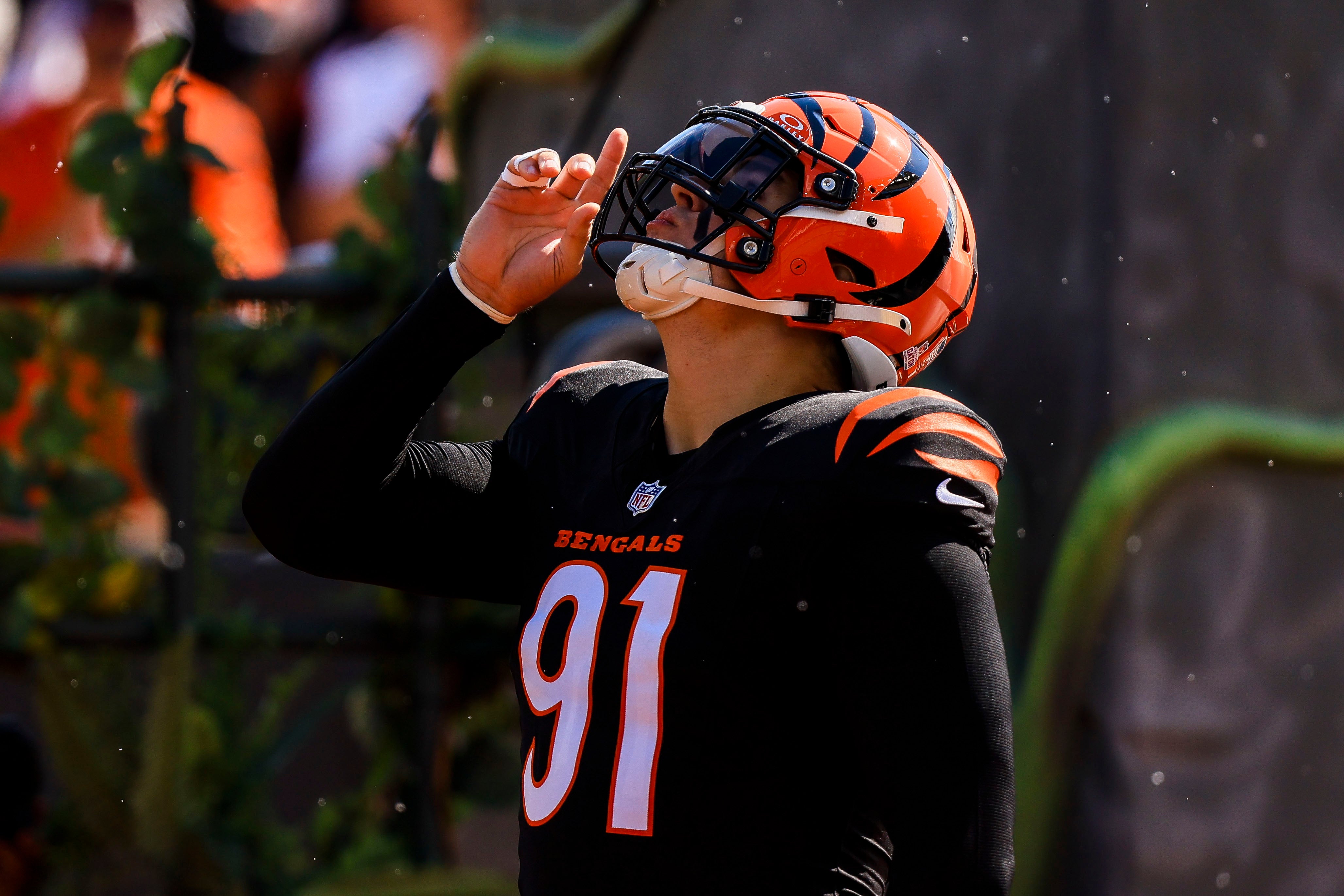 Oct 6, 2024; Cincinnati, Ohio, USA; Cincinnati Bengals defensive end Trey Hendrickson (91) runs onto the field before the game against the Baltimore Ravens at Paycor Stadium.