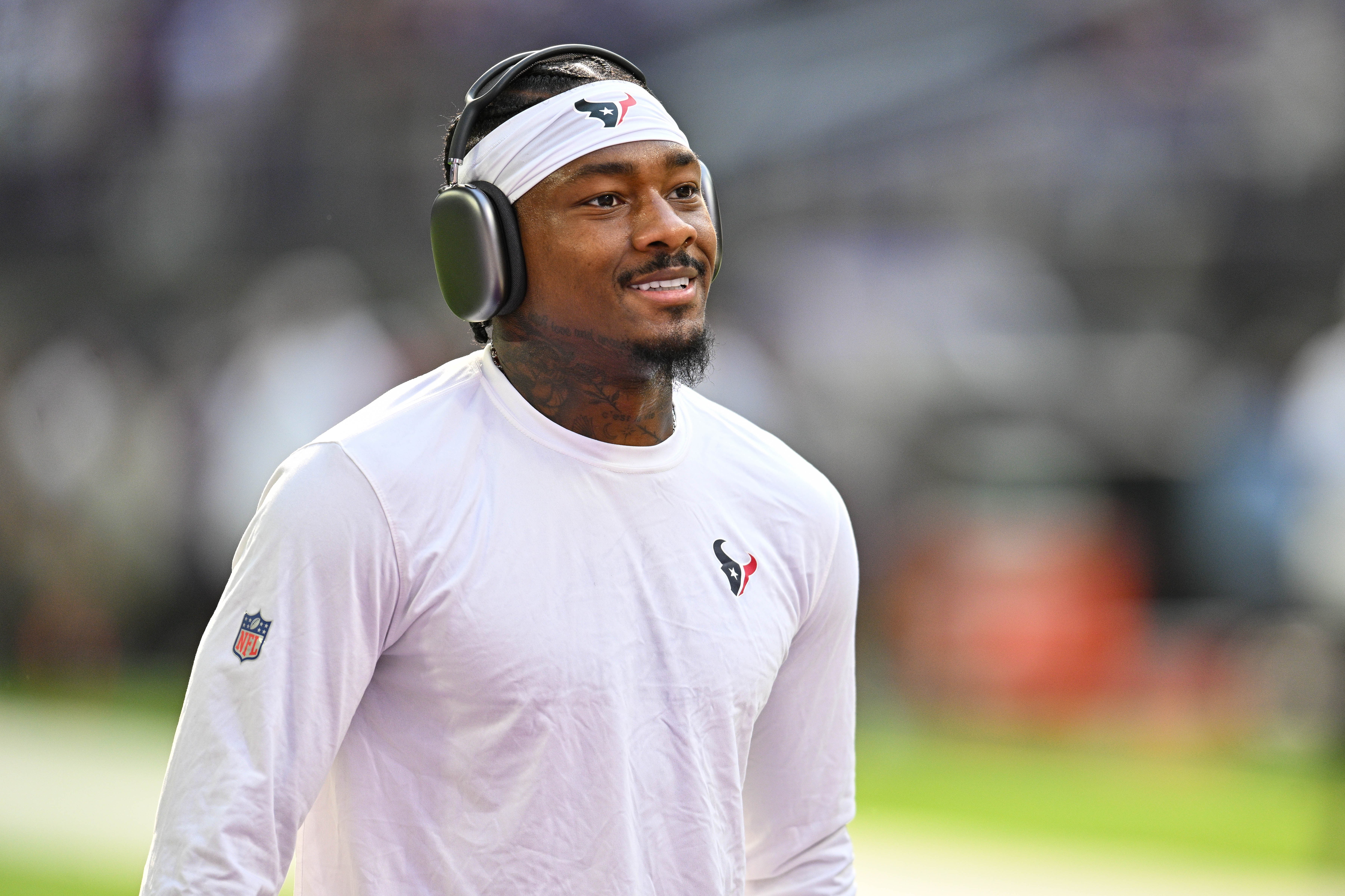 Sep 22, 2024; Minneapolis, Minnesota, USA; Houston Texans wide receiver Stefon Diggs (1) warms up before the game against the Minnesota Vikings at U.S. Bank Stadium.