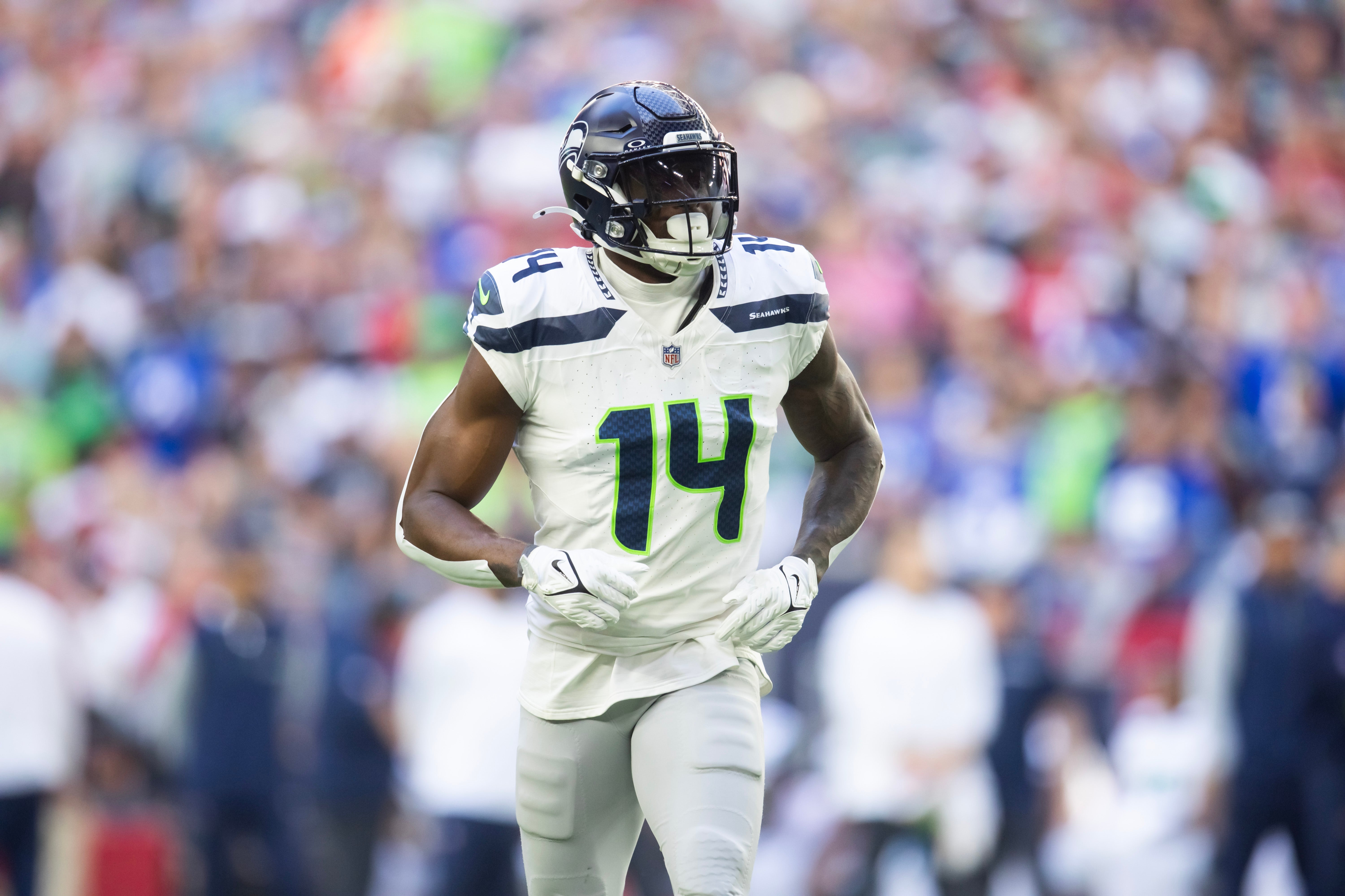 Dec 8, 2024; Glendale, Arizona, USA; Seattle Seahawks wide receiver DK Metcalf (14) against the Arizona Cardinals at State Farm Stadium.