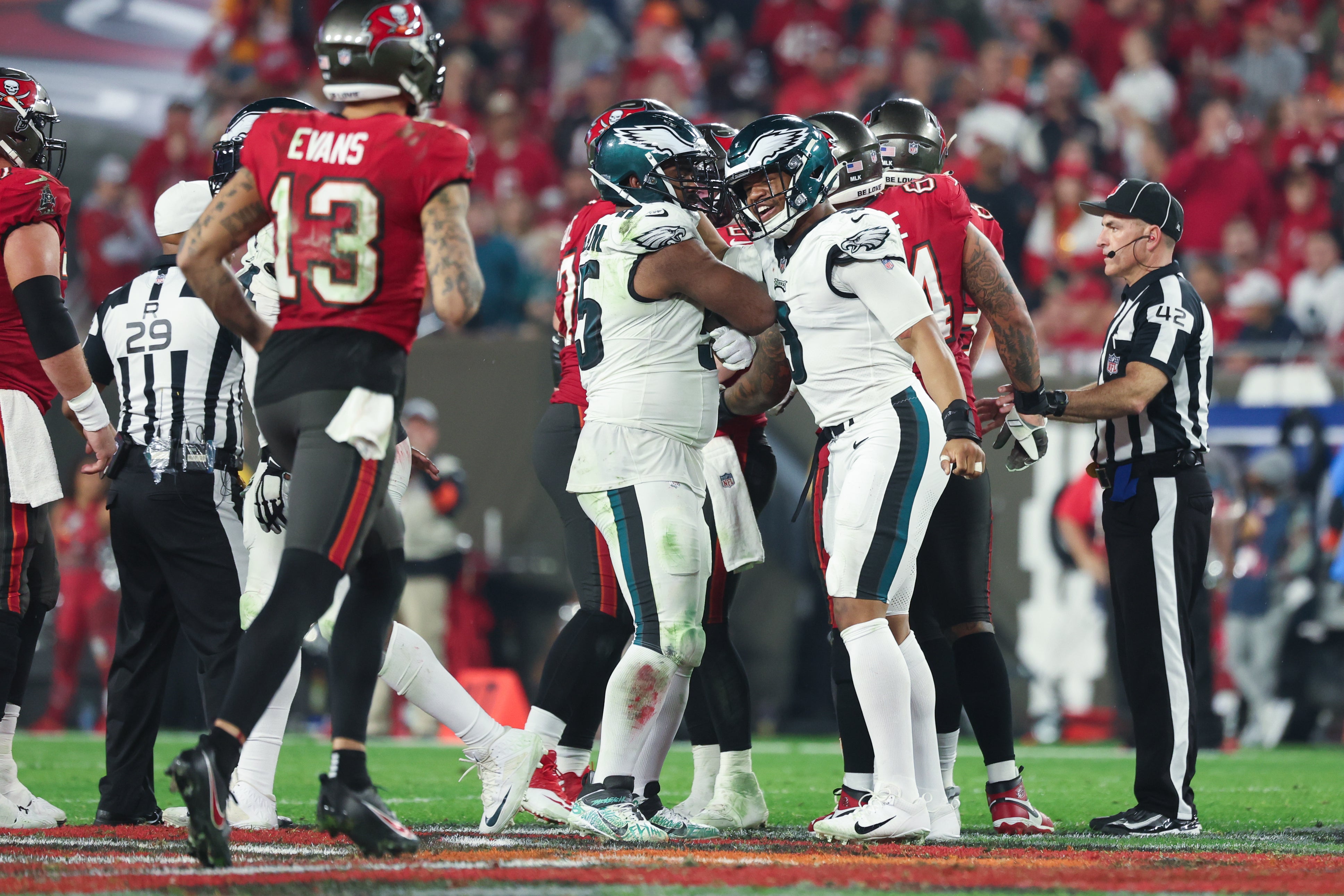 Philadelphia Eagles defensive end Brandon Graham (55) and linebacker Nolan Smith (3) celebrate a sack on Tampa Bay Buccaneers quarterback Baker Mayfield (6) during the second half of a 2024.