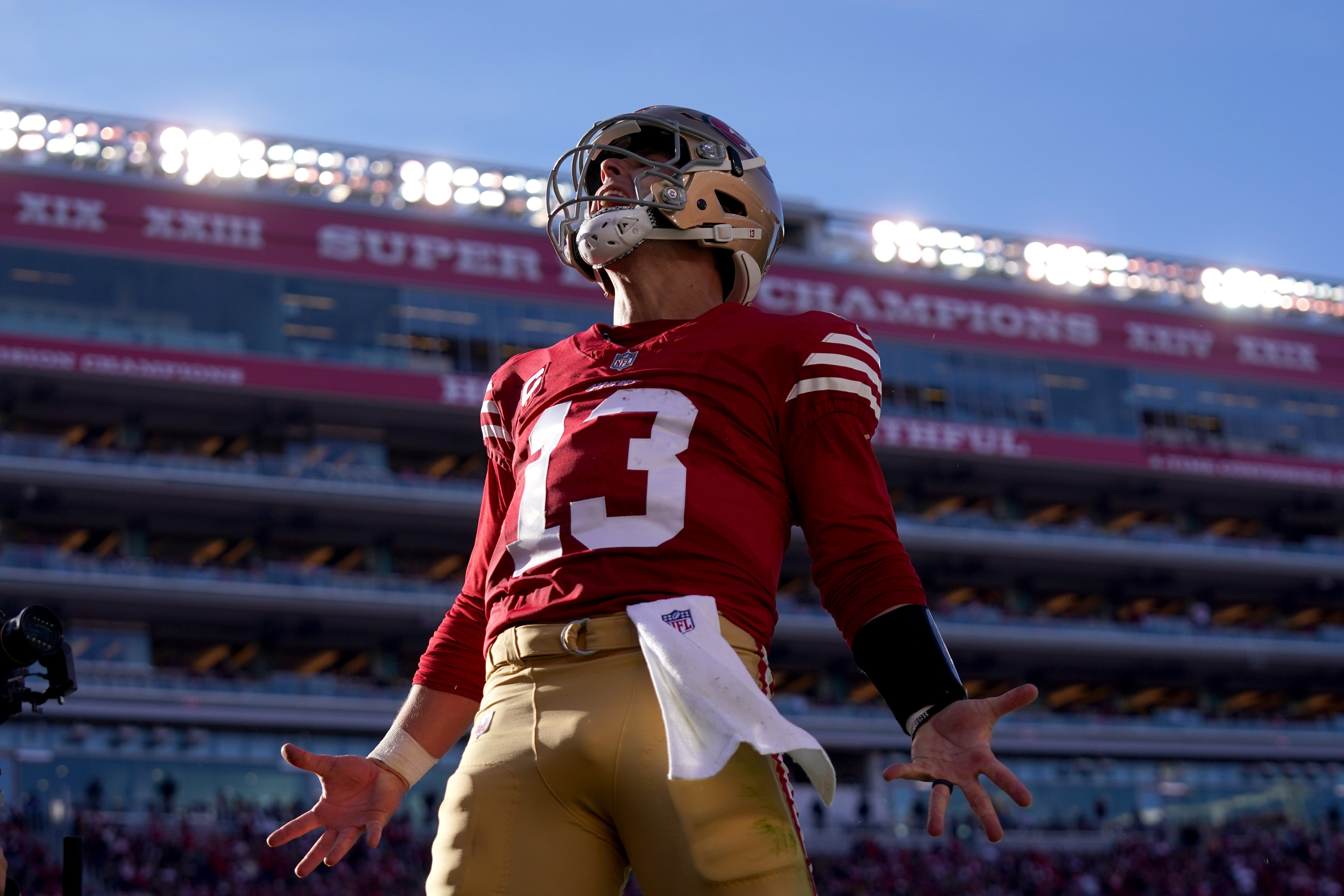 Dec 8, 2024; Santa Clara, California, USA; San Francisco 49ers quarterback Brock Purdy (13) reacts after rushing for a touchdown against the Chicago Bears in the second quarter at Levi's Stadium. The play was later called back for offensive holding.