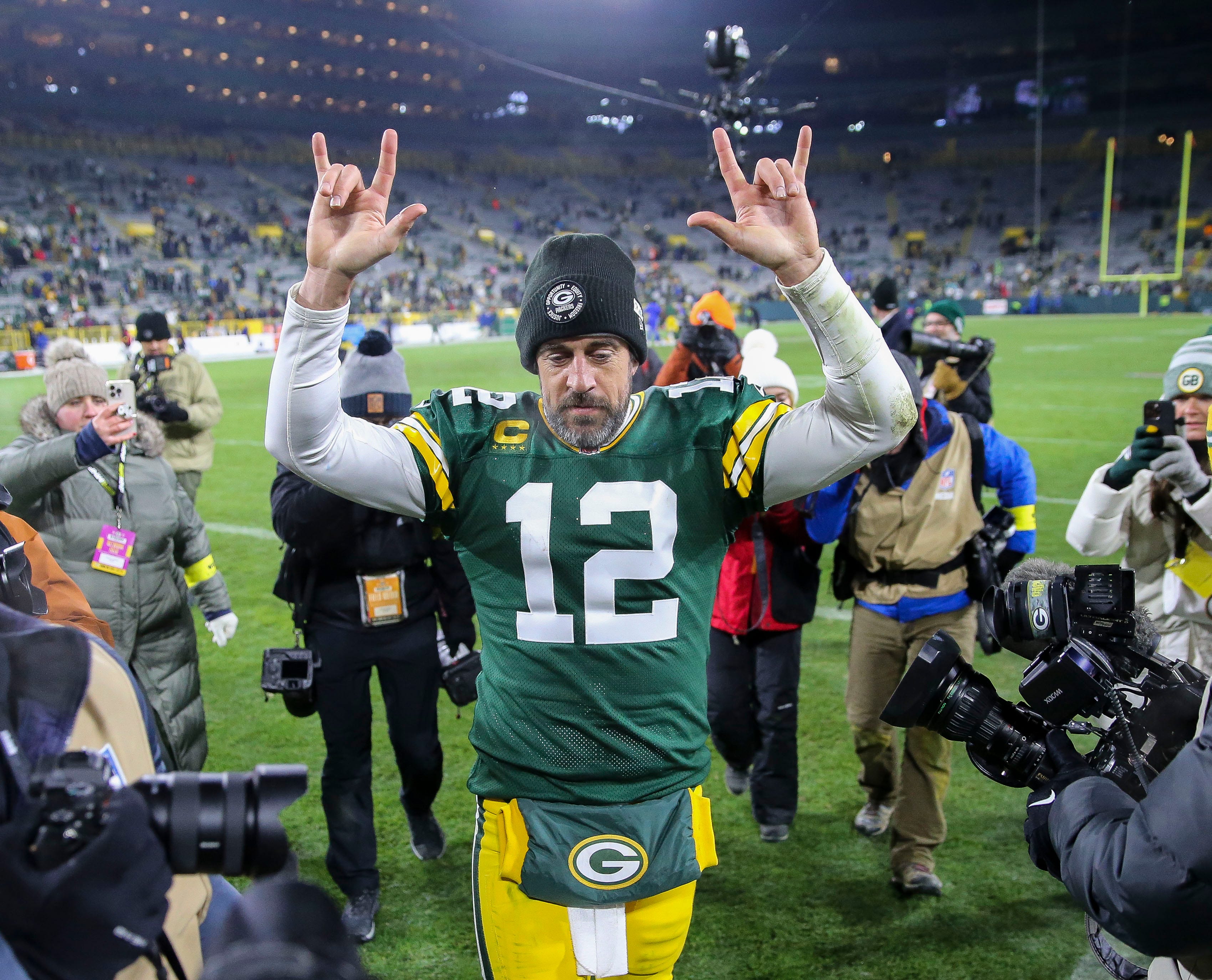 Green Bay Packers quarterback Aaron Rodgers (12) gestures to fans as he leaves the field after a game against the Los Angeles Rams on Monday, December 19, 2022, at Lambeau Field in Green Bay, Wis. The Packers won the game, 24-12
