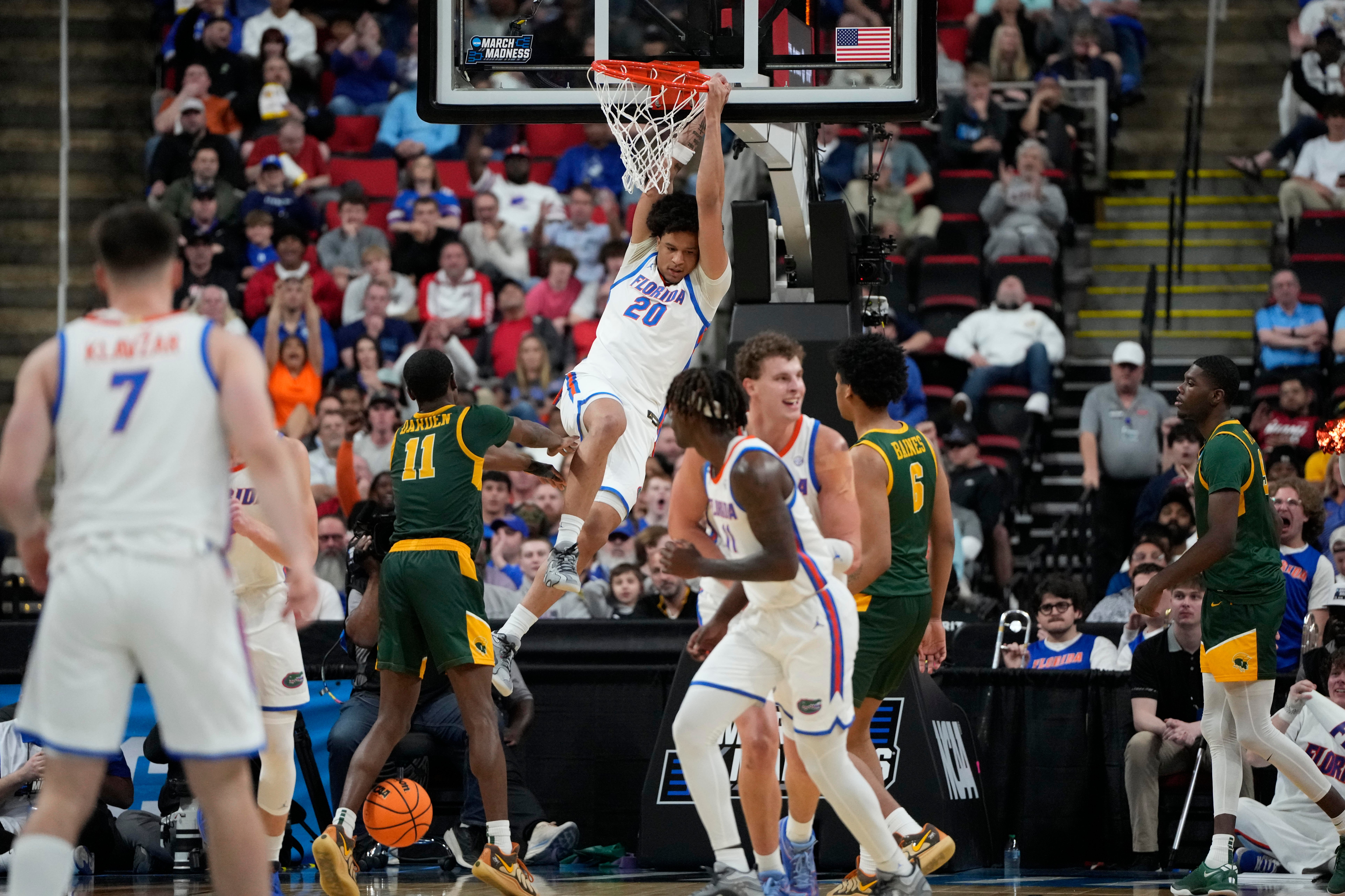 Mar 21, 2025; Raleigh, NC, USA; Florida Gators guard Isaiah Brown (20) makes a basket during the second half against the Norfolk State Spartans at Lenovo Center.