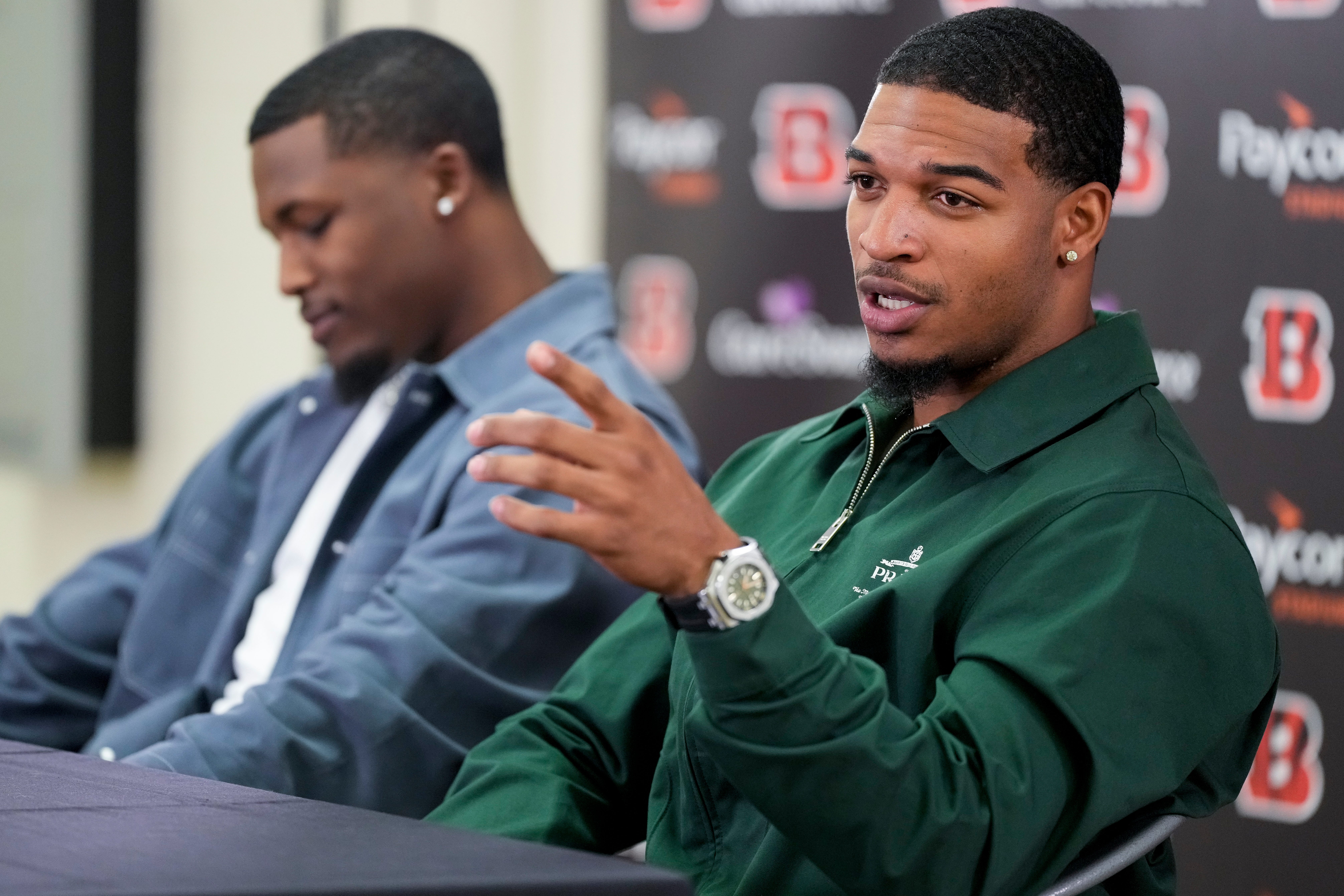 Ja’Marr Chase takes questions during a press conference to announce the signing of new contracts for Cincinnati Bengals wide receivers Ja’Marr Chase and Tee Higgins at Paycor Stadium in downtown Cincinnati on Tuesday, March 18, 2025. Chase becomes the new highest-paid non-quarterback player in the NFL.