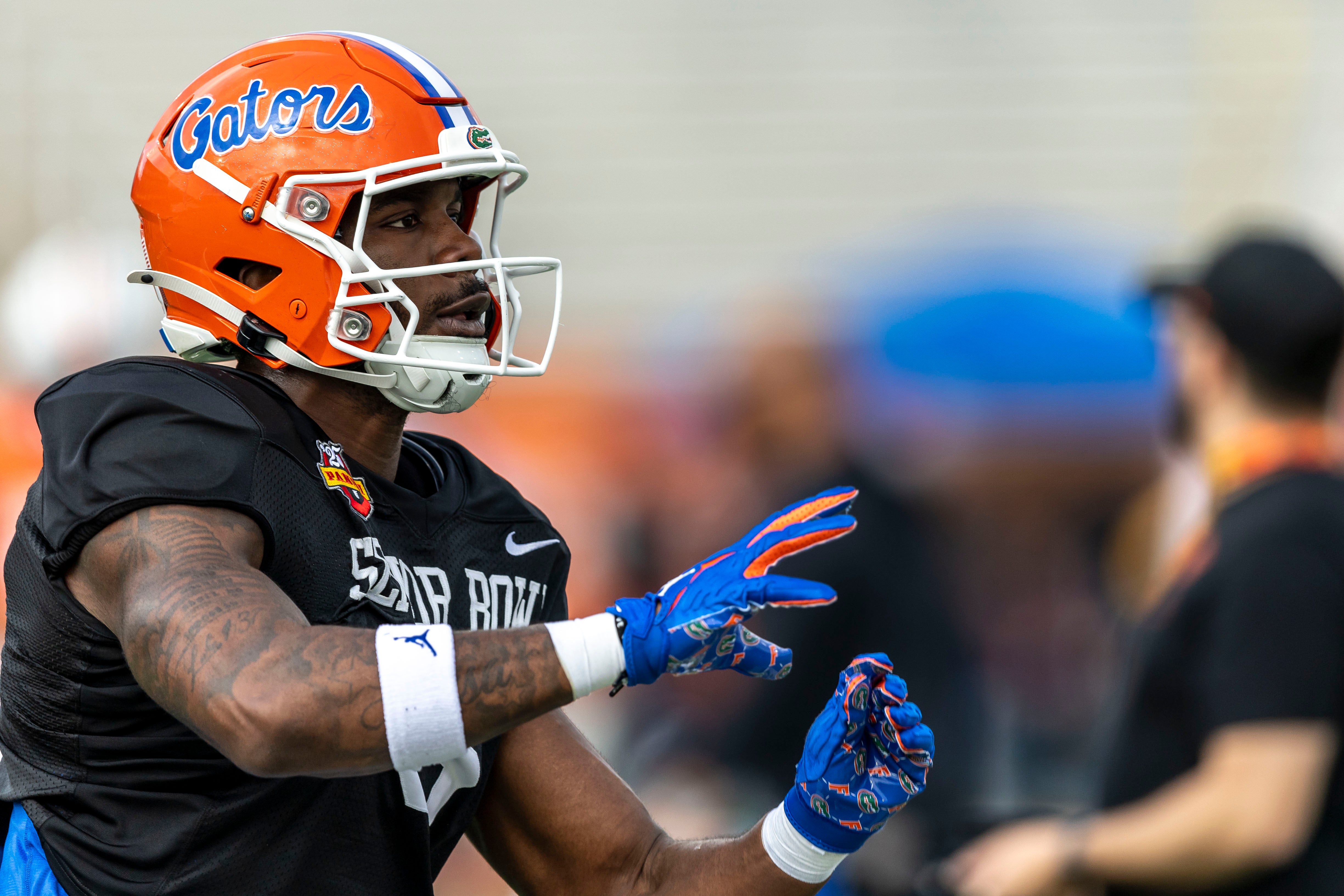 Jan 30, 2025; Mobile, AL, USA; American team linebacker Shemar James of Florida (6) works through drills during Senior Bowl practice for the American team at Hancock Whitney Stadium.
