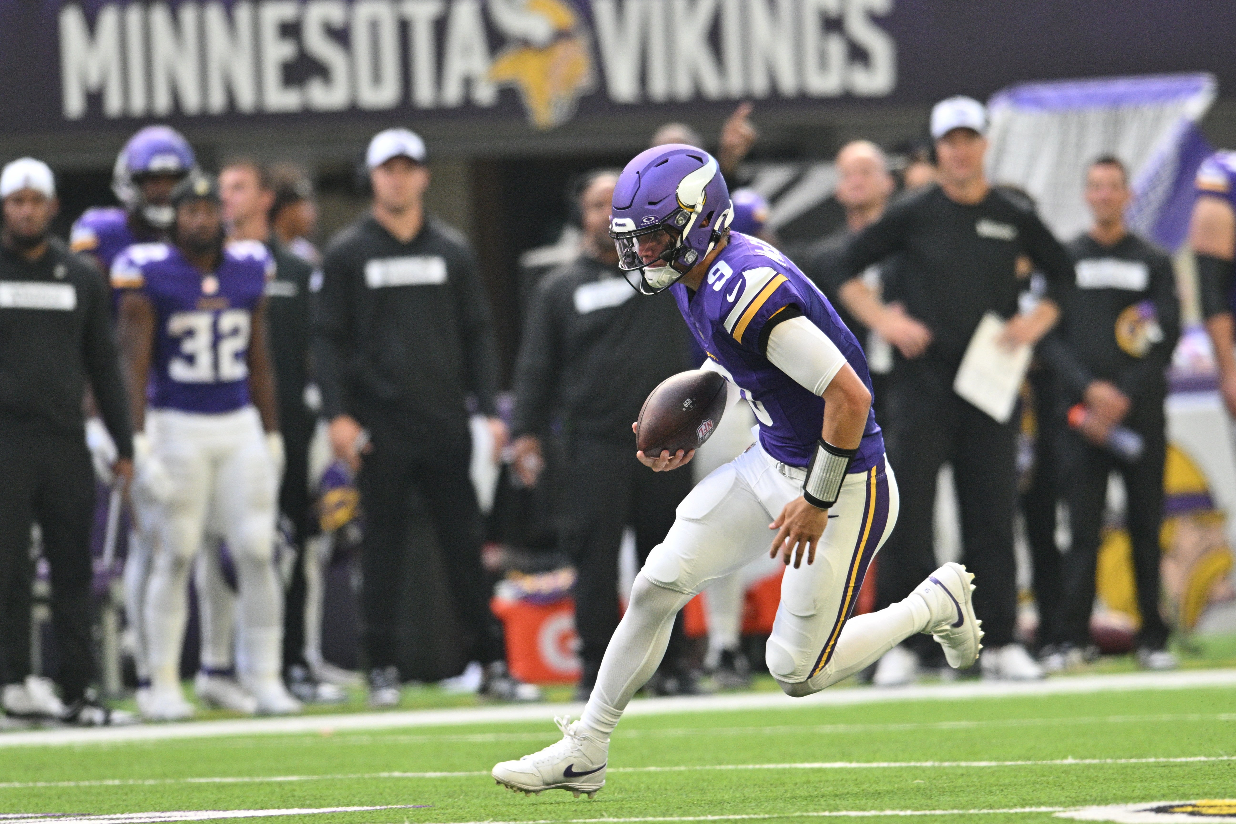 Aug 10, 2024; Minneapolis, Minnesota, USA; Minnesota Vikings quarterback J.J. McCarthy (9) runs the ball during the second quarter against the Las Vegas Raiders at U.S. Bank Stadium.