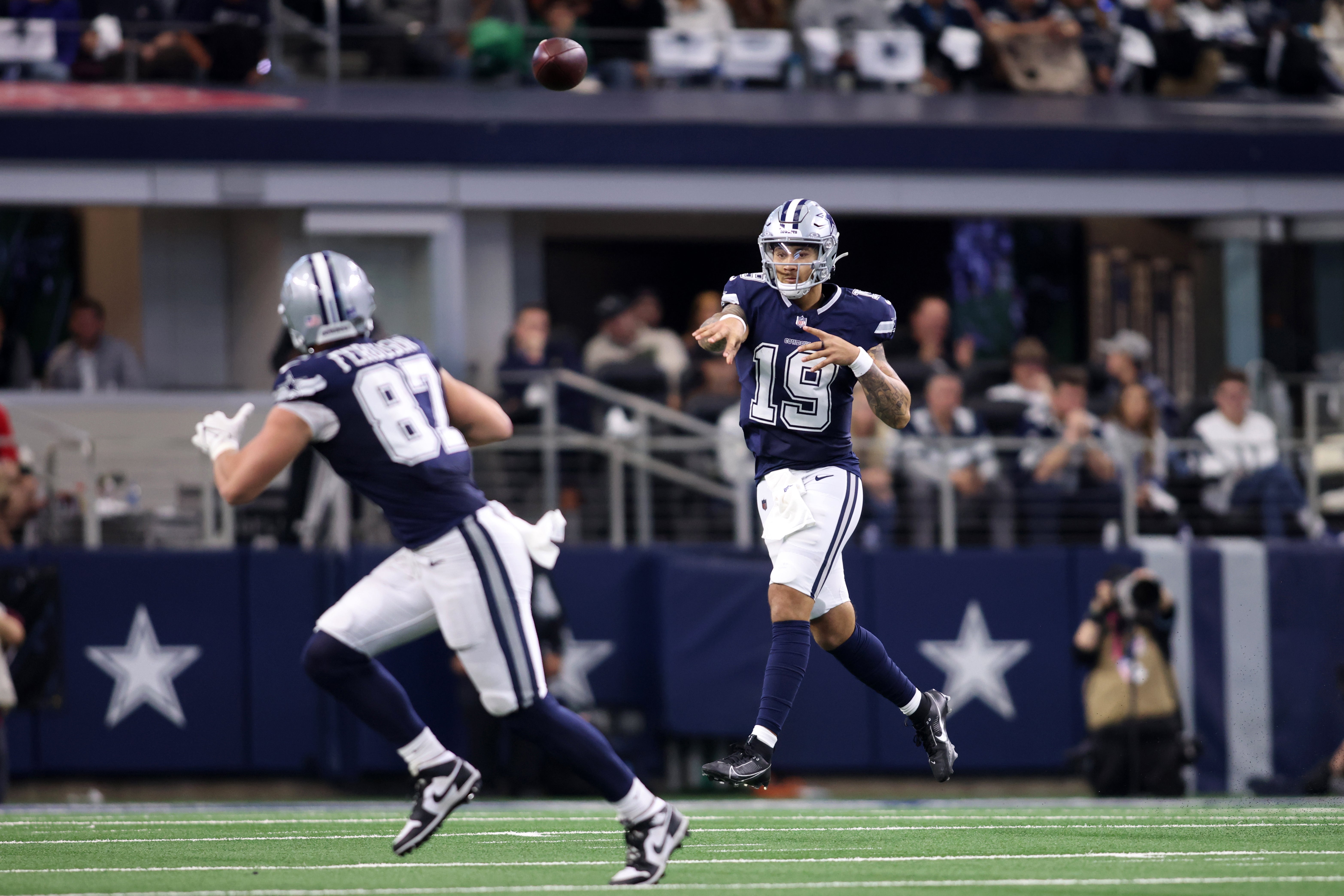 Dallas Cowboys quarterback Trey Lance (19) throws a pass against the Washington Commanders during the fourth quarter at AT&T Stadium.