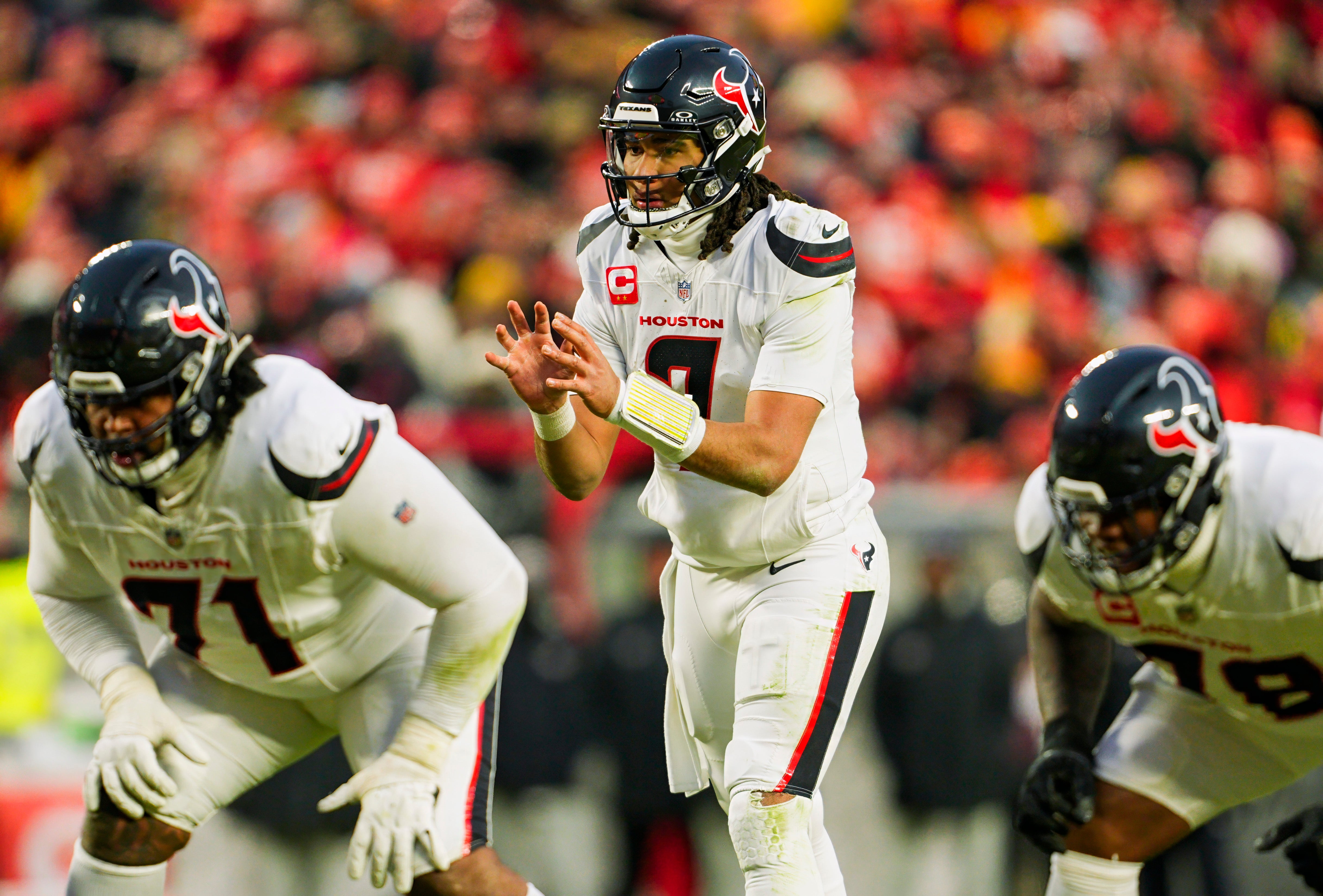 Jan 18, 2025; Kansas City, Missouri, USA; Houston Texans quarterback C.J. Stroud (7) gets ready before the snap during the second half against the Kansas City Chiefs in a 2025 AFC divisional round game at GEHA Field at Arrowhead Stadium.