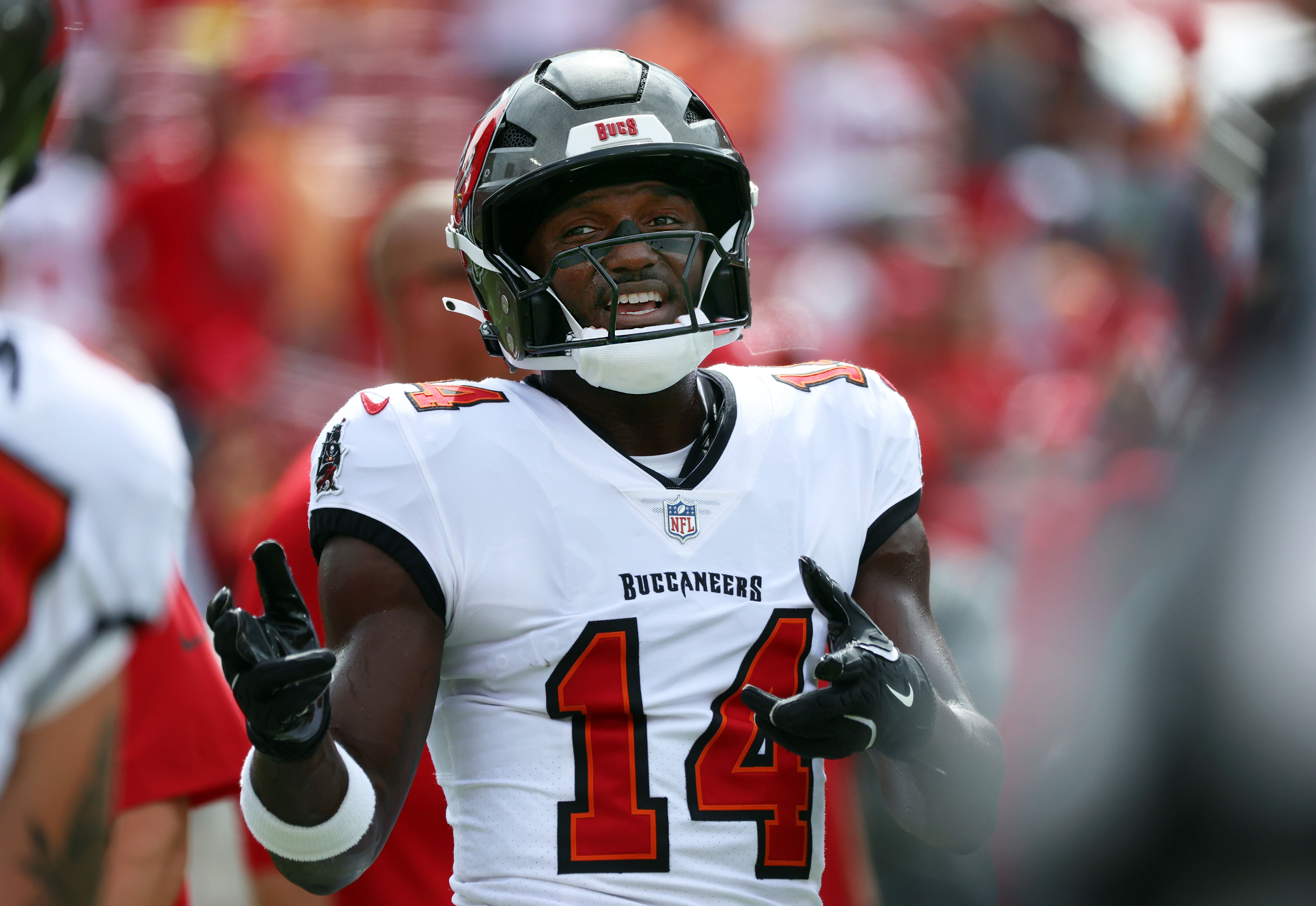 Sep 8, 2024; Tampa, Florida, USA; Tampa Bay Buccaneers wide receiver Chris Godwin (14) looks on against the Washington Commanders works out prior to the game at Raymond James Stadium.