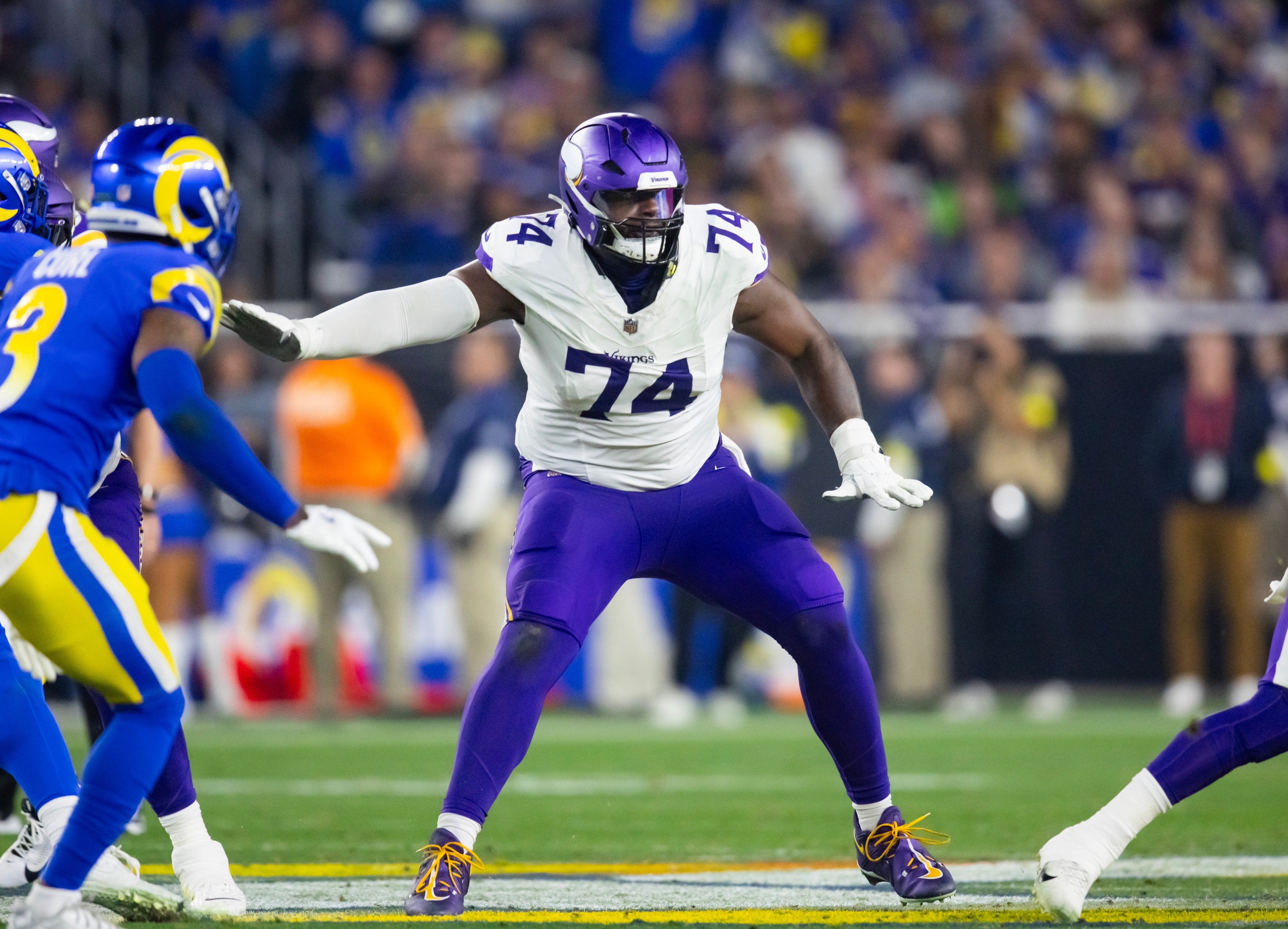 Jan 13, 2025; Glendale, AZ, USA; Minnesota Vikings tackle Cam Robinson (74) against the Los Angeles Rams during an NFC wild card game at State Farm Stadium.