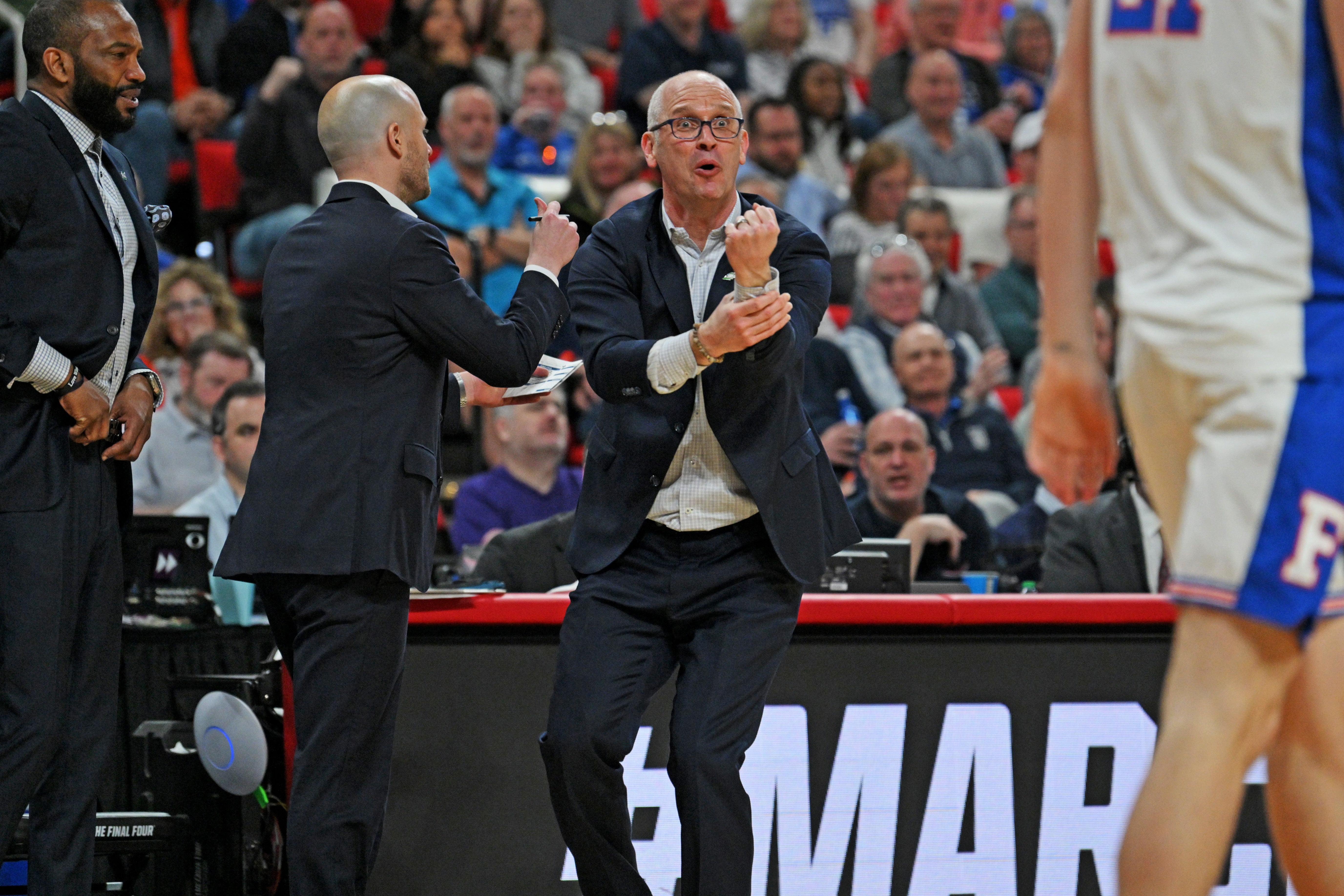 Mar 23, 2025; Raleigh, NC, USA; Connecticut Huskies head coach Dan Hurley reacts after a play during the second half against the Florida Gators in the second round of the NCAA Tournament at Lenovo Center.