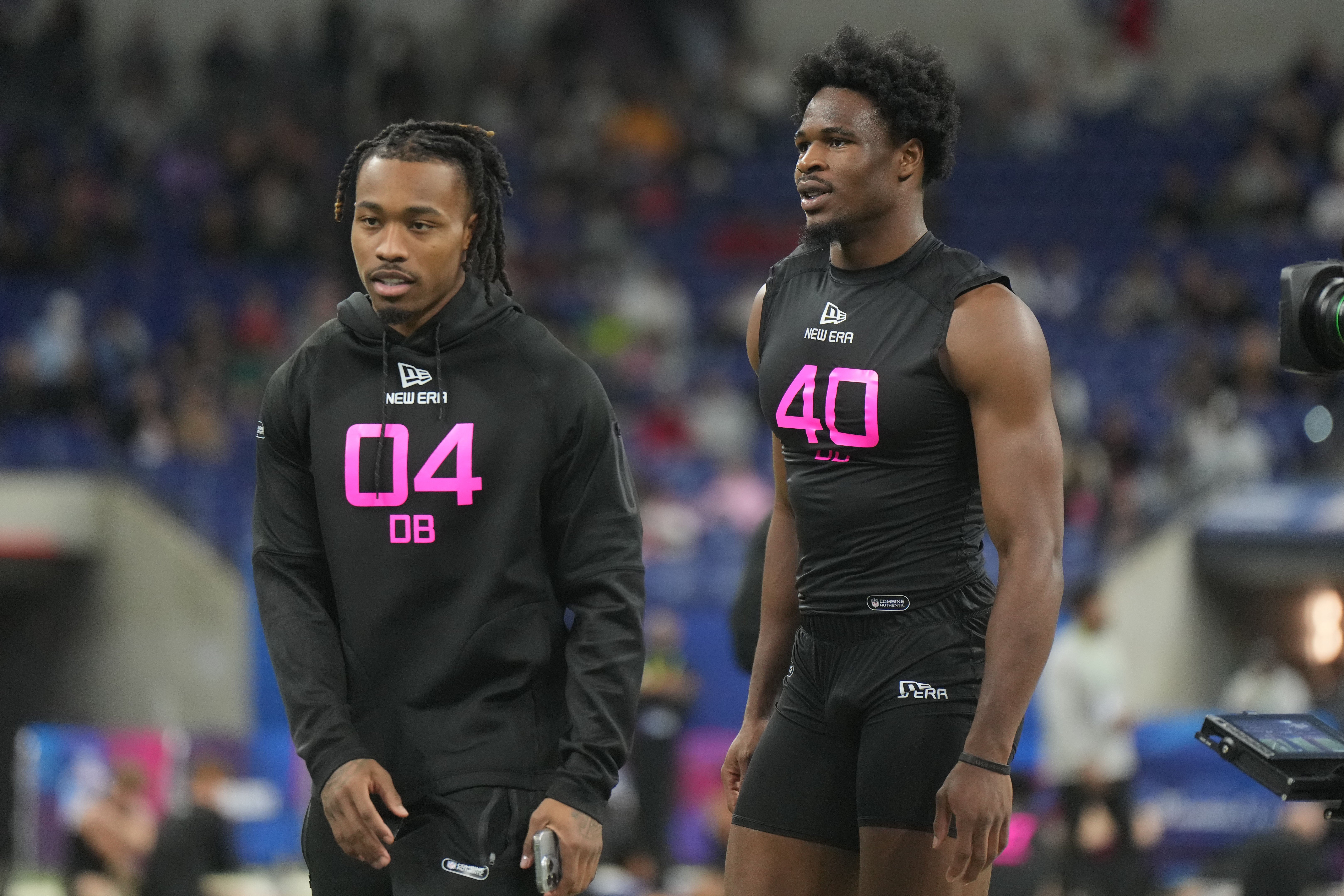 Feb 28, 2025; Indianapolis, IN, USA; South Carolina defensive back Nick Emmanwori (DB40) and Texas defensive back Jahdae Barron (DB04) look on during the 2025 NFL Combine at Lucas Oil Stadium.