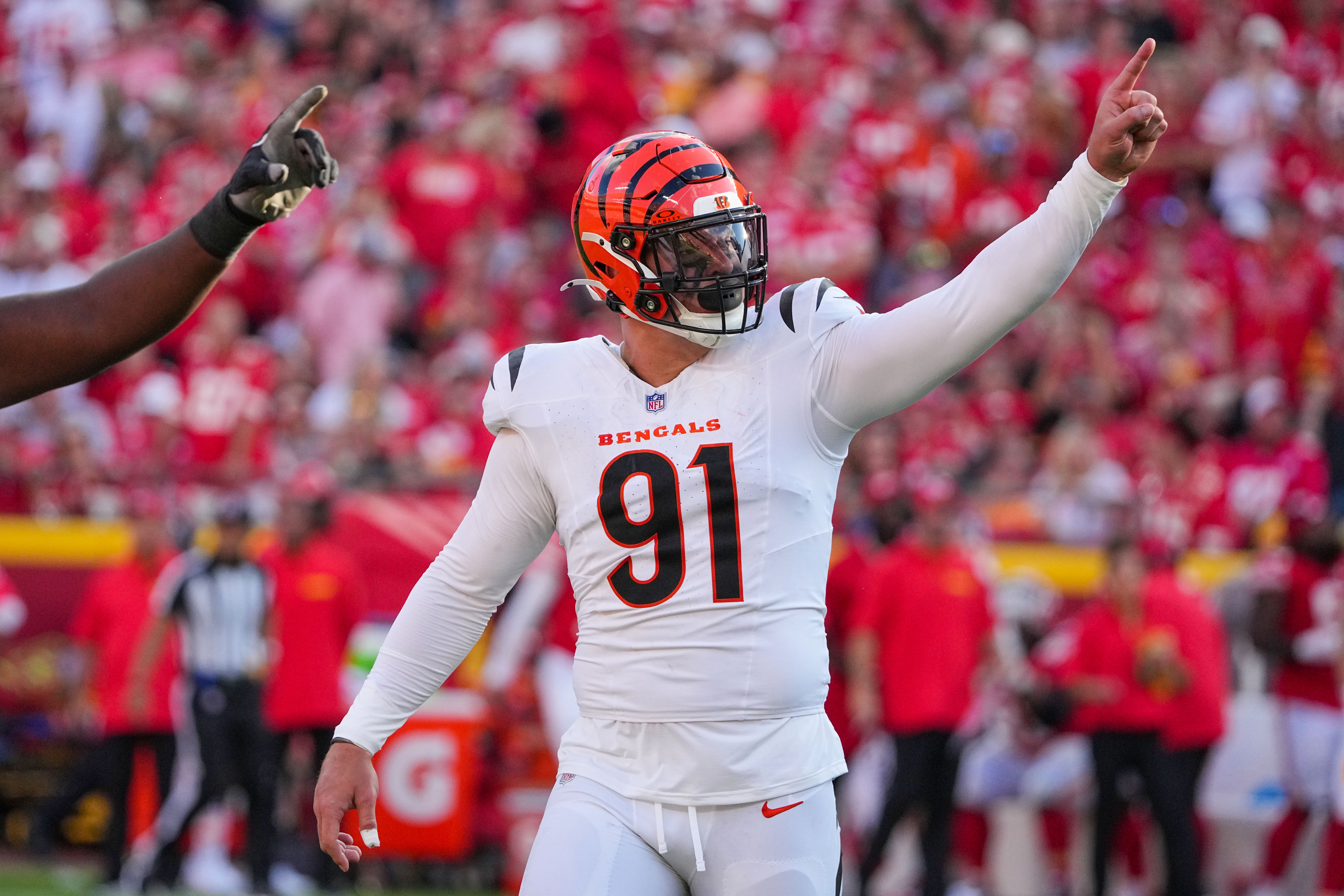 Sep 15, 2024; Kansas City, Missouri, USA; Cincinnati Bengals defensive end Trey Hendrickson (91) celebrates against the Kansas City Chiefs after a play during the game at GEHA Field at Arrowhead Stadium.
