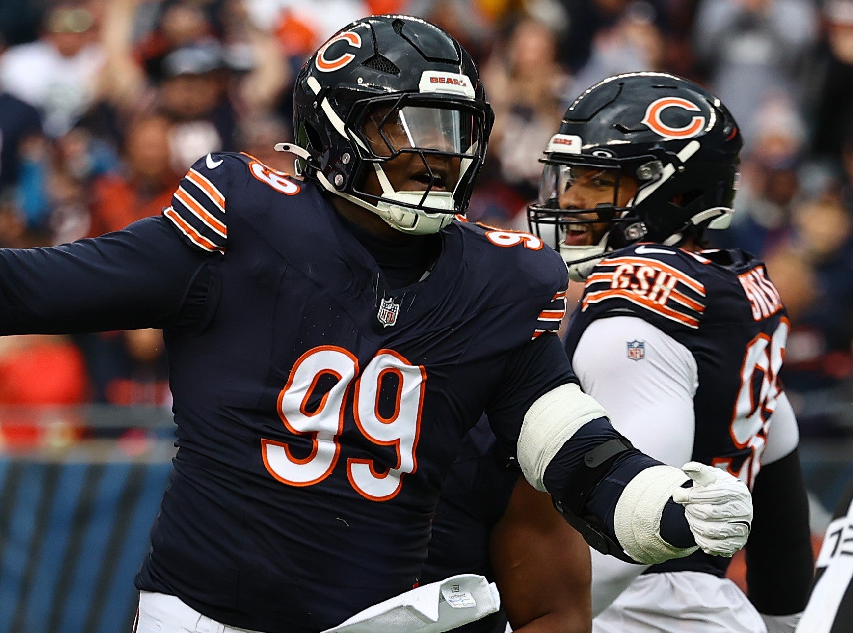 Nov 10, 2024; Chicago, Illinois, USA; Chicago Bears defensive tackle Gervon Dexter Sr. (99) reacts against the New England Patriots during the first quarter at Soldier Field.