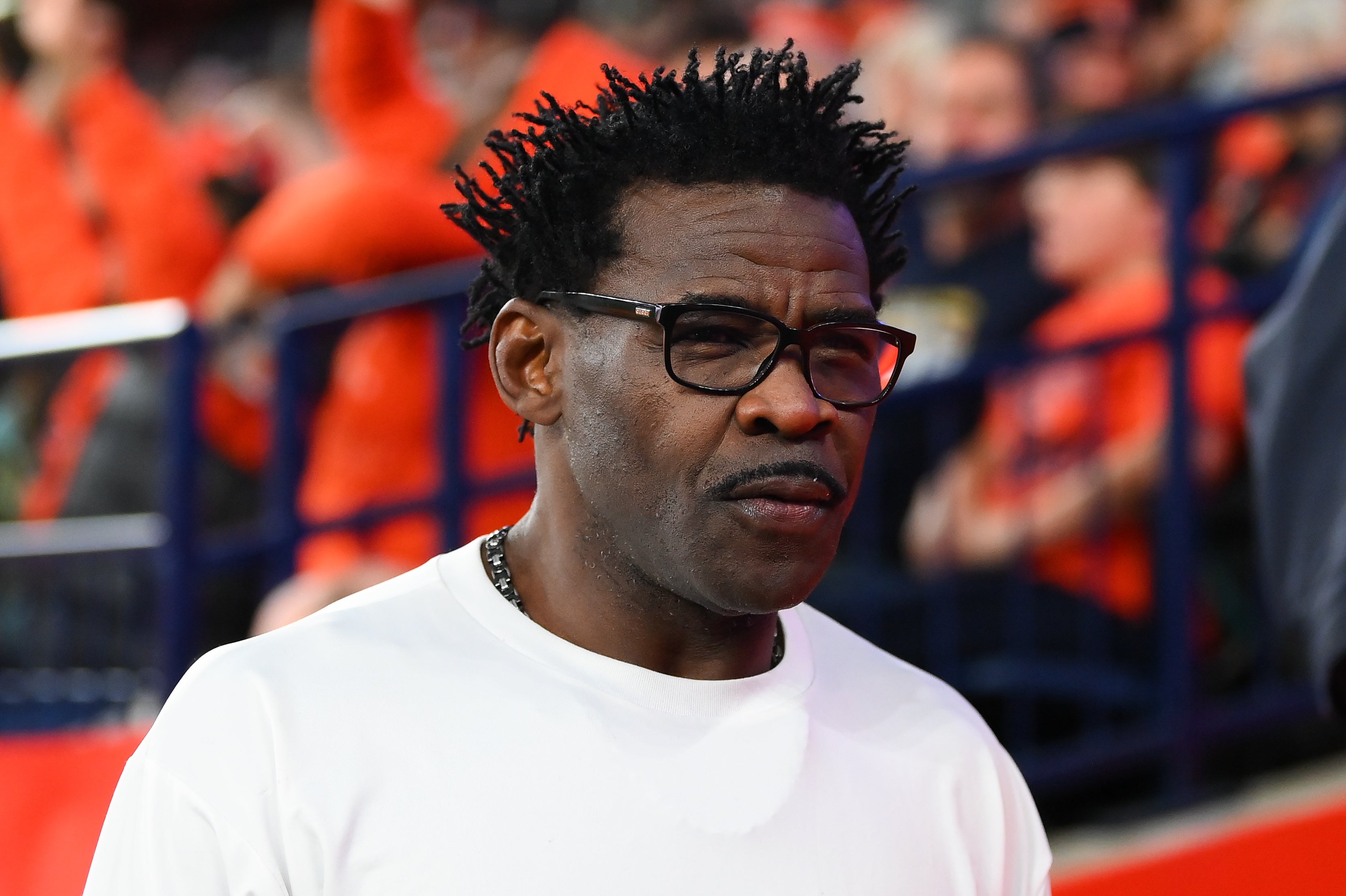 Nov 30, 2024; Syracuse, New York, USA; Miami Hurricanes former player and NFL Hall of Fame member Michael Irvin looks on during the first half of a game between the Miami Hurricanes and the Syracuse Orange at the JMA Wireless Dome.