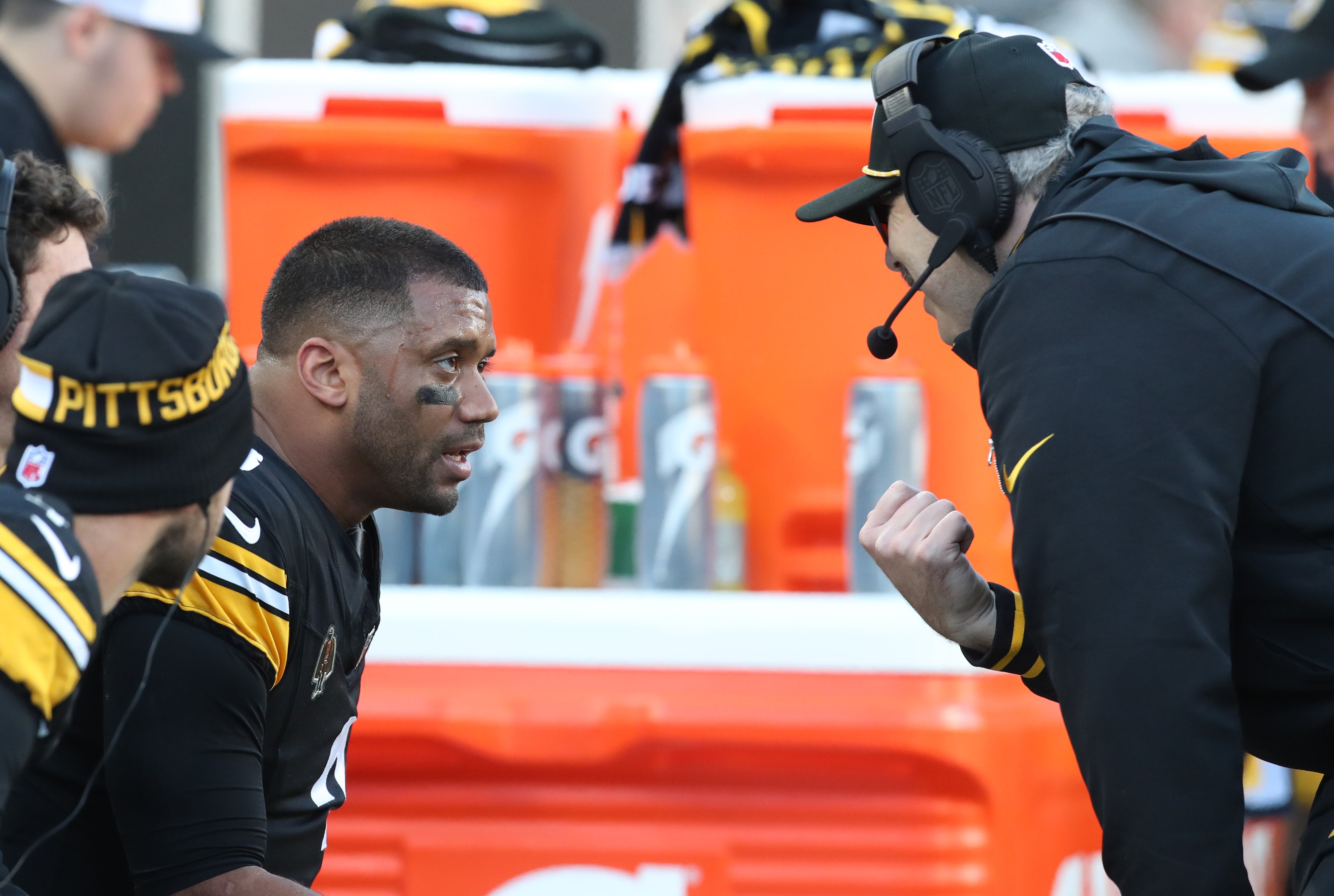 Dec 8, 2024; Pittsburgh, Pennsylvania, USA; Pittsburgh Steelers quarterback Russell Wilson (left) talks with offensive coordinator Arthur Smith (right) on the sidelines against the Cleveland Browns during the third quarter at Acrisure Stadium.
