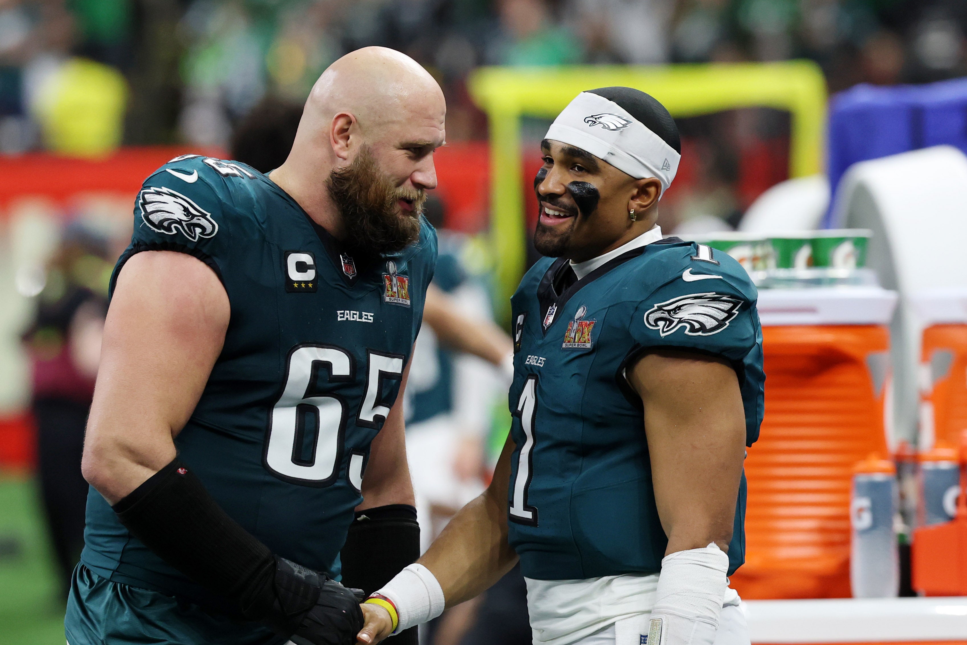 NFL: Super Bowl LIX-Kansas City Chiefs at Philadelphia Eagles Philadelphia Eagles offensive tackle Lane Johnson (65) shakes hands with quarterback Jalen Hurts (1) during the second half of Super Bowl LIX at Caesars Superdome.