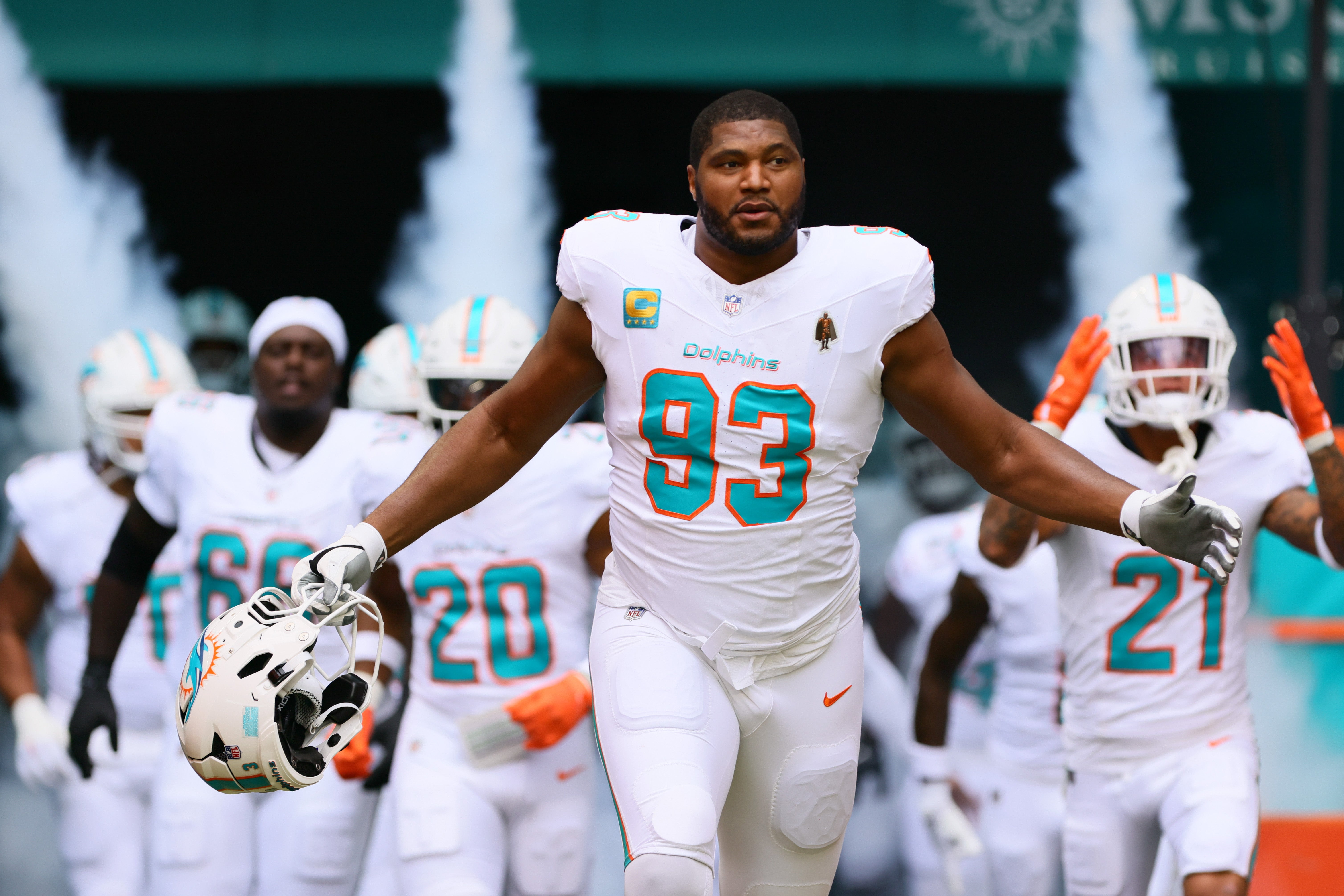 Miami Dolphins defensive tackle Calais Campbell (93) enters the field before the game against the Arizona Cardinals at Hard Rock Stadium.