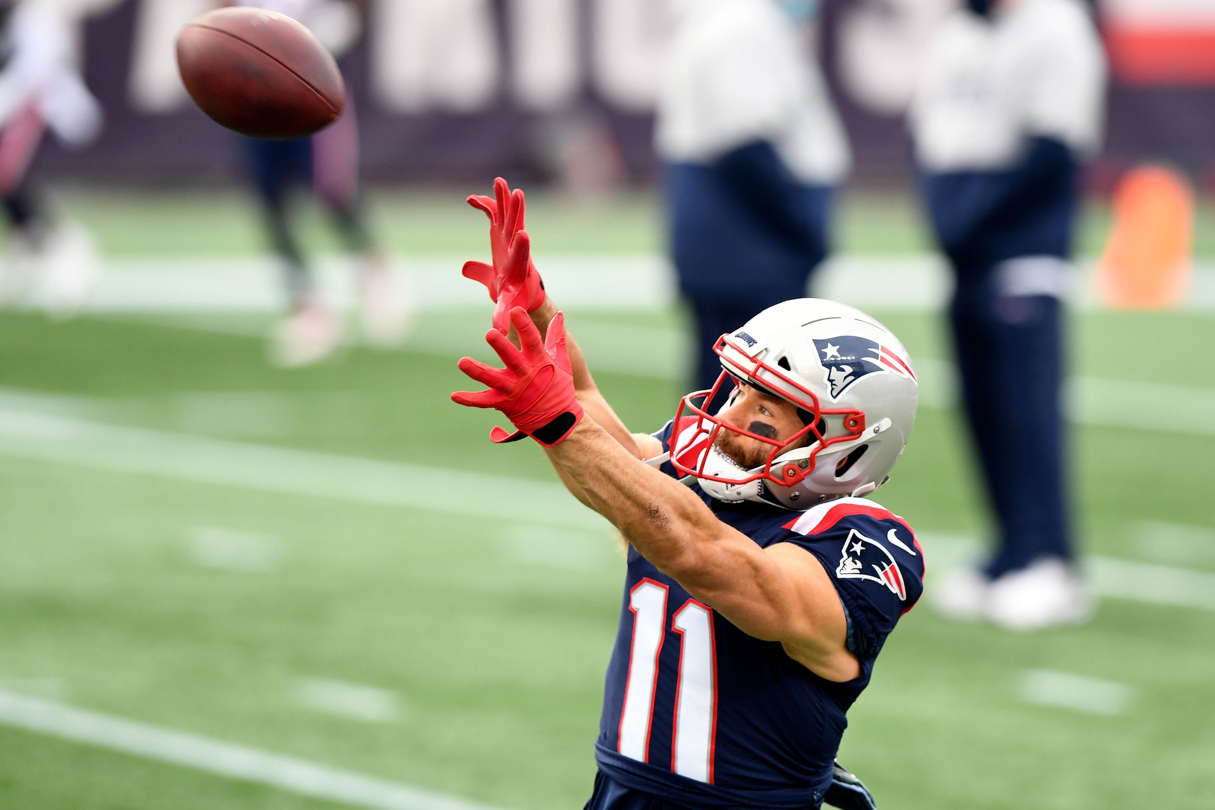 Oct 25, 2020; Foxborough, Massachusetts, USA; New England Patriots wide receiver Julian Edelman (11) catches a ball during warmups before a game against the San Francisco 49ers at Gillette Stadium.